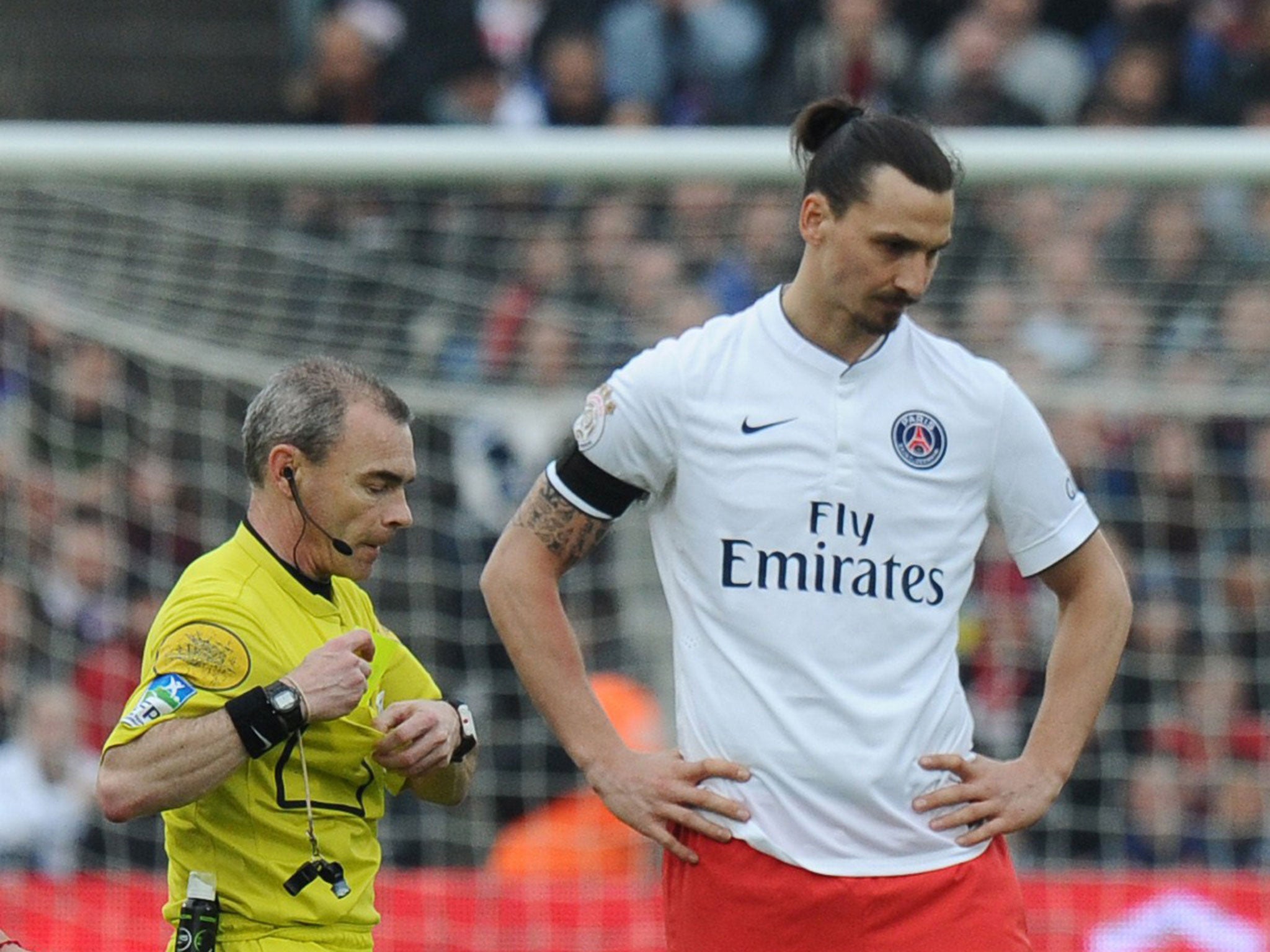 Zlatan Ibrahimovic (right) next to referee Lionel Jaffredo during PSG's loss at Bordeaux