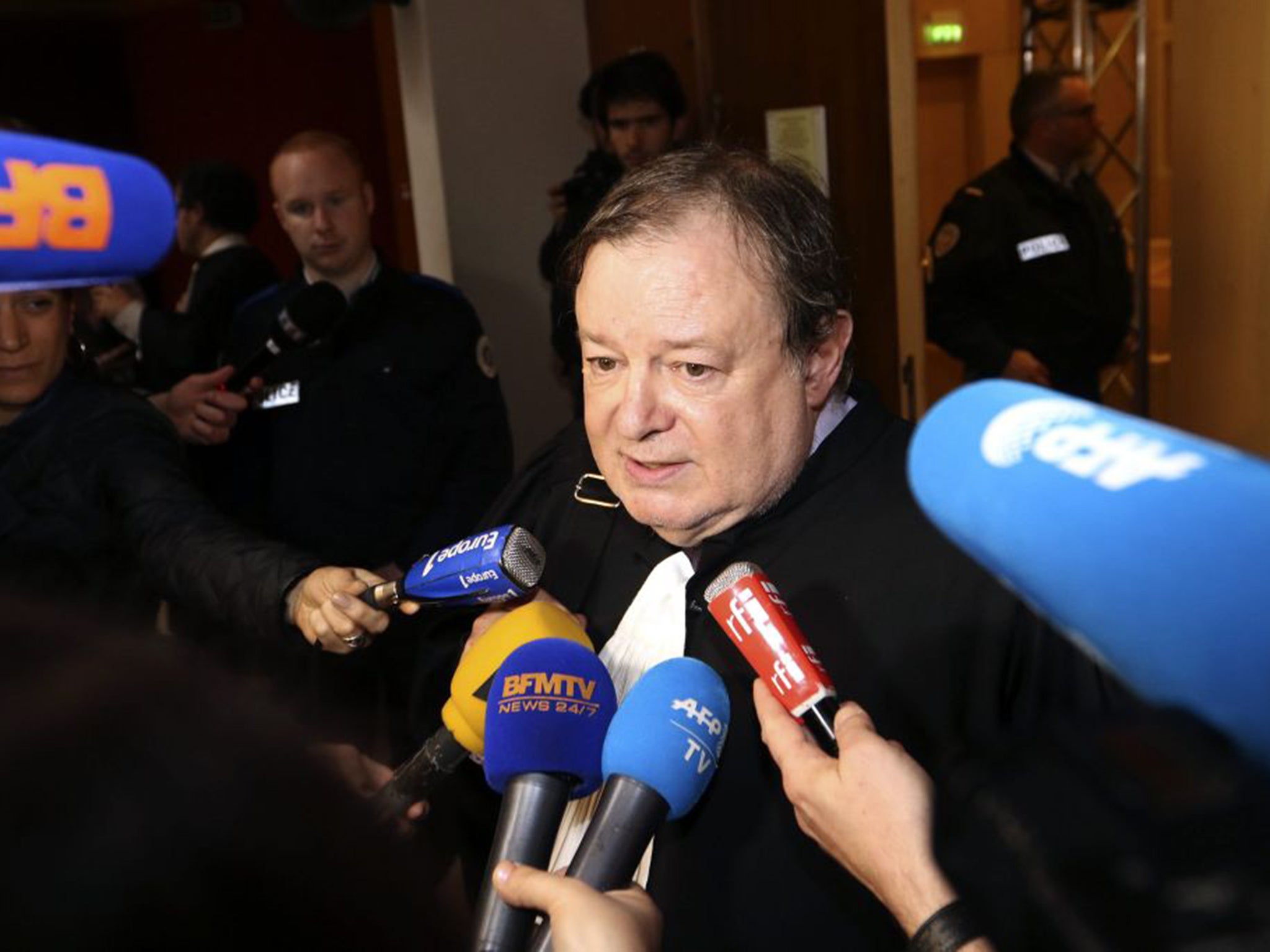 Jean-Pierre Mignard, a lawyer for the victims’ families, addressing the media