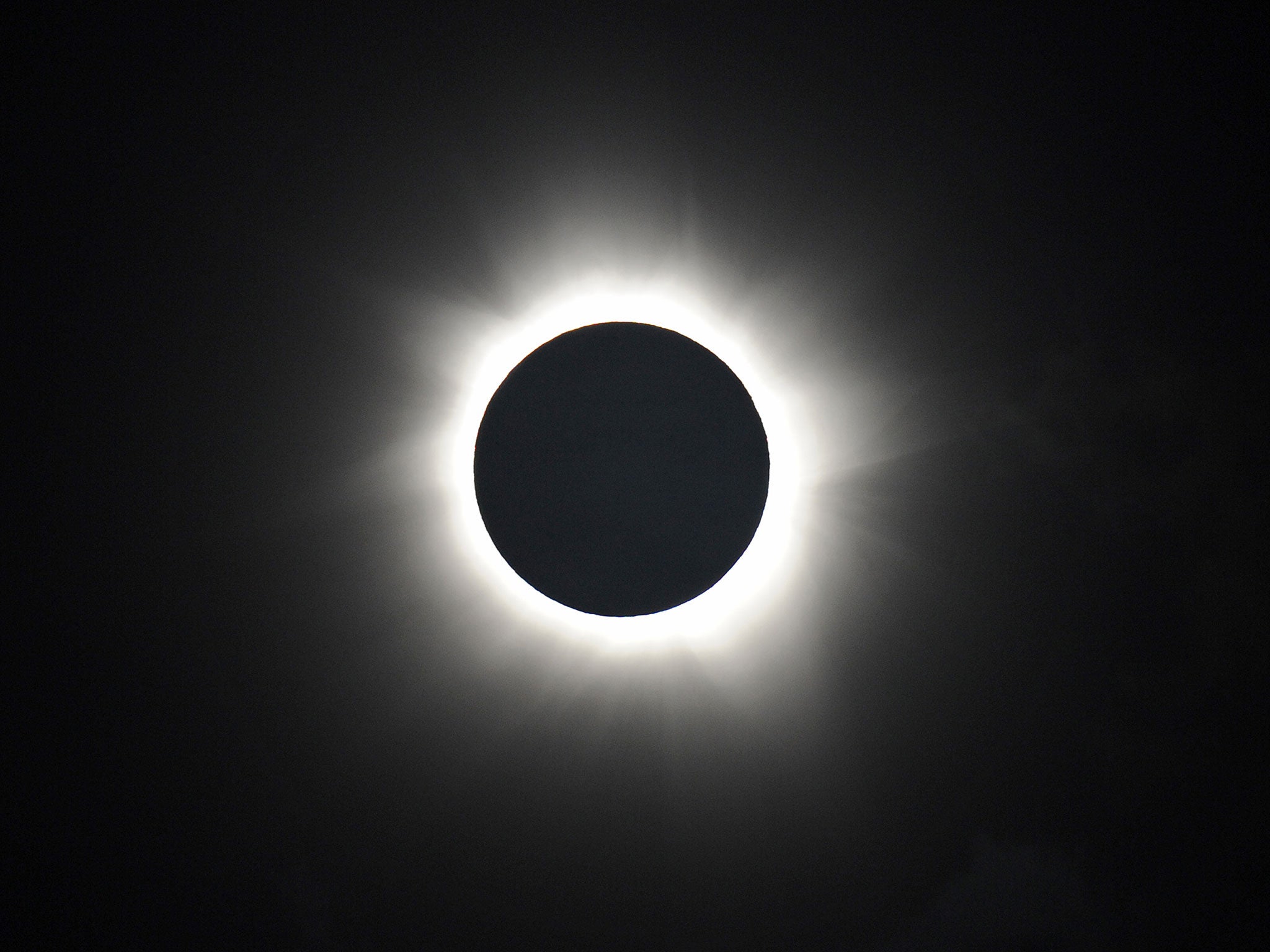 Totality is shown during the solar eclipse at Palm Cove in Australia's Tropical North Queensland