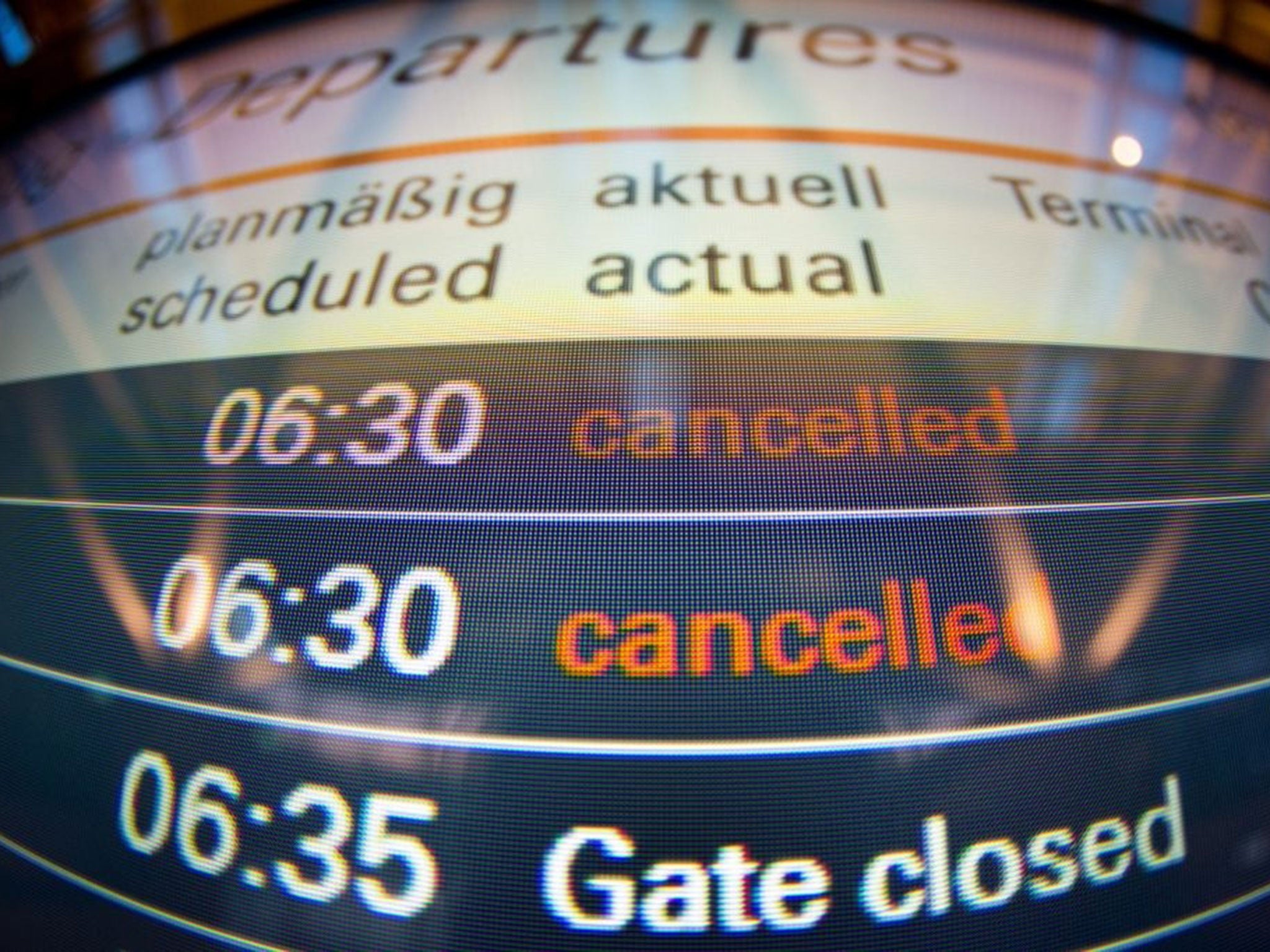 An information panel showing early morning departures and cancellations at the airport in Hamburg, Germany, 18 March 2015. German airline Lufthansa planned to cancel about 750 flights after its pilots announced their 12th strike in a year as part of a lon