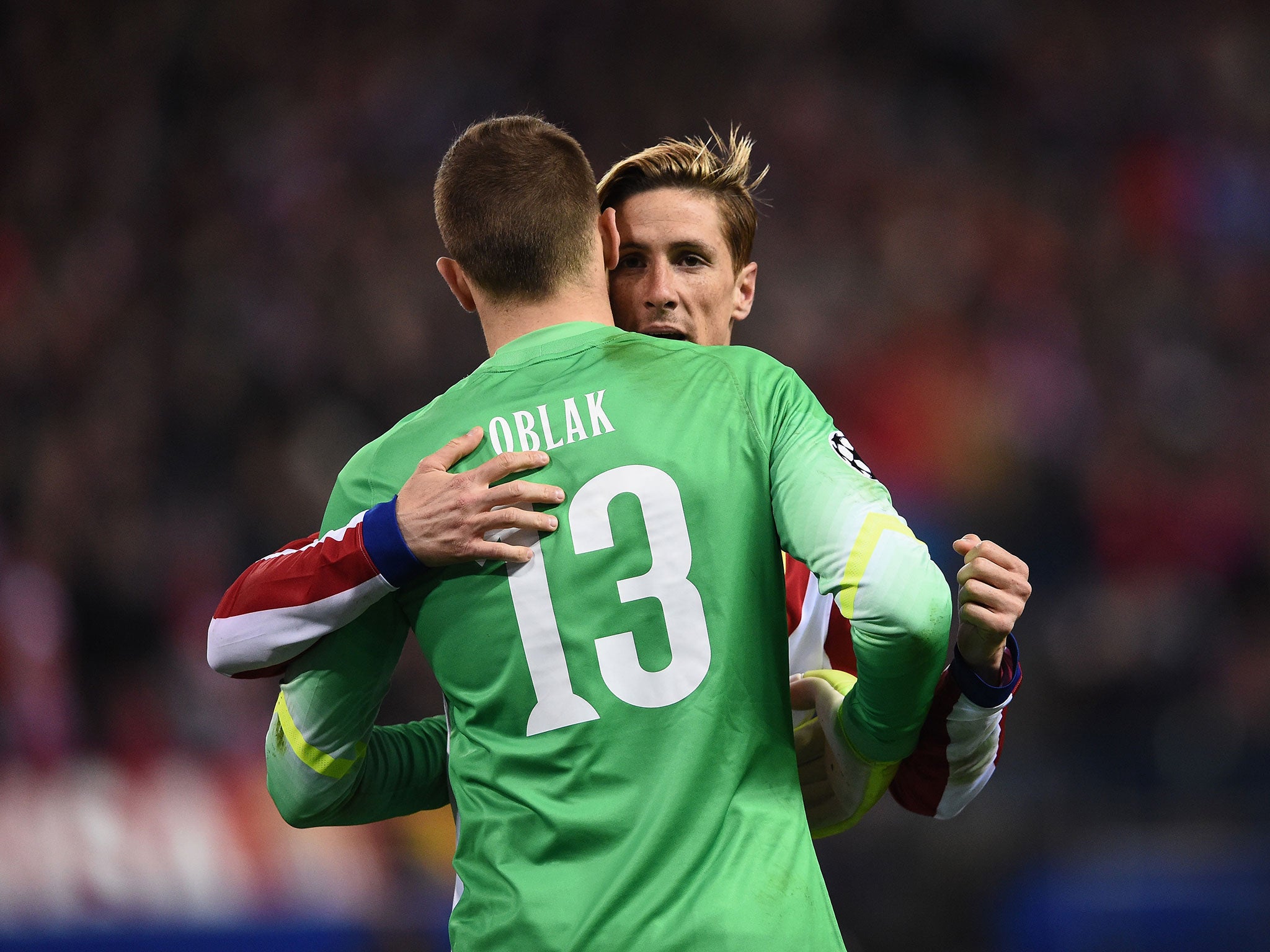 Torres congratulates goalkeeper Jan Oblak