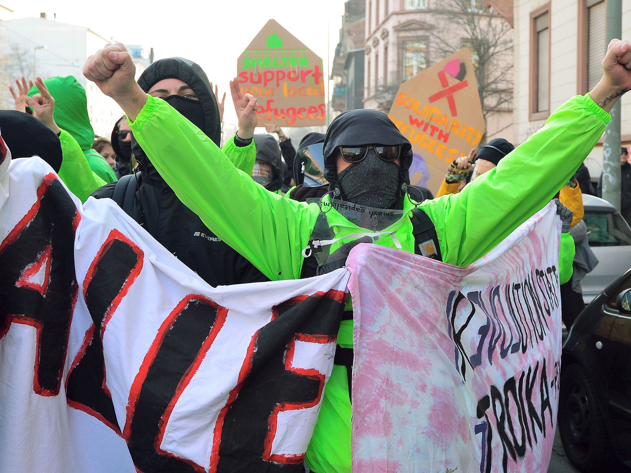 Activists march in a demonstration organized by the Blockupy movement