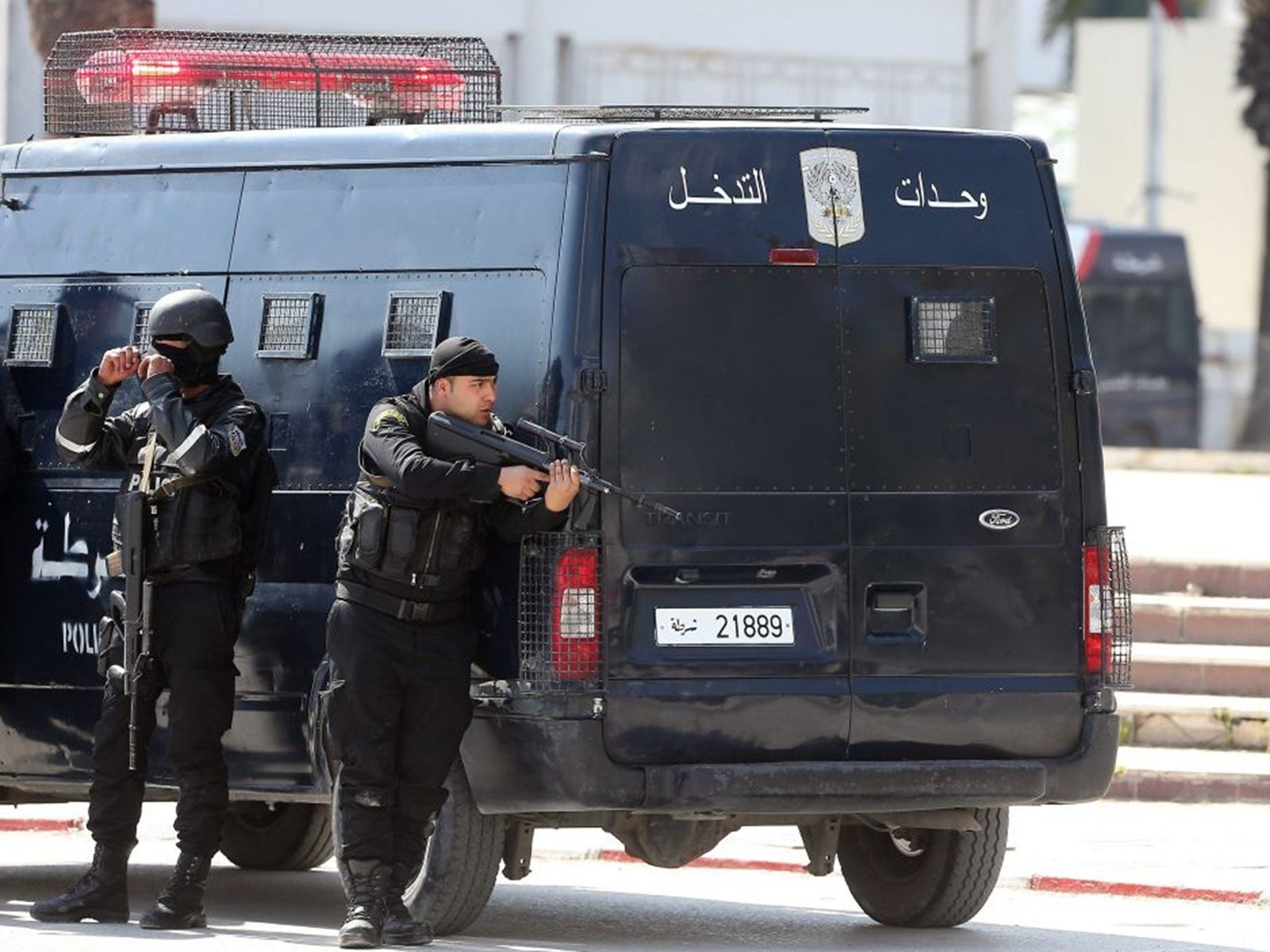 Members of the Tunisian security services take up a position outside the National Bardo Museum, near the country's parliament after gunmen reportedly took hostages at Tunisia museum in Tunis,Tunisia on 18 March 2015