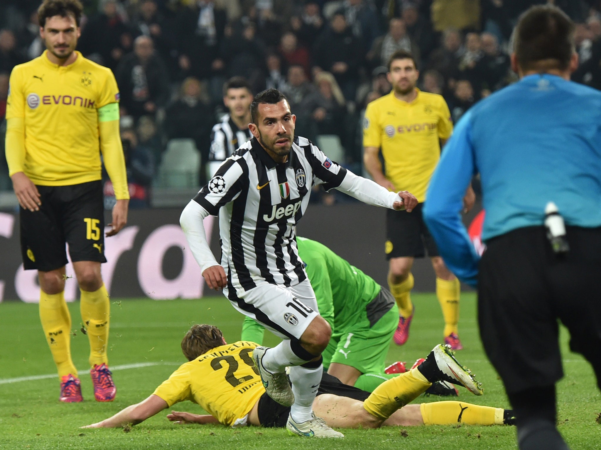 Juventus forward Carlos Tevez celebrates his goal against Borussia Dortmund in the first leg