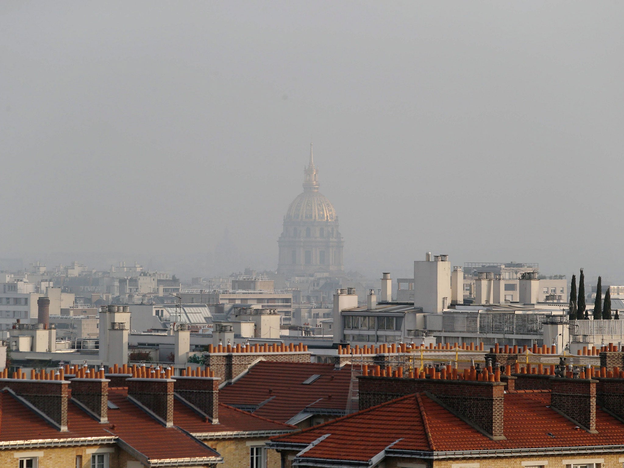 A general view of the Hotel des Invalides and Paris surrounded by high level air pollution on Wednesday