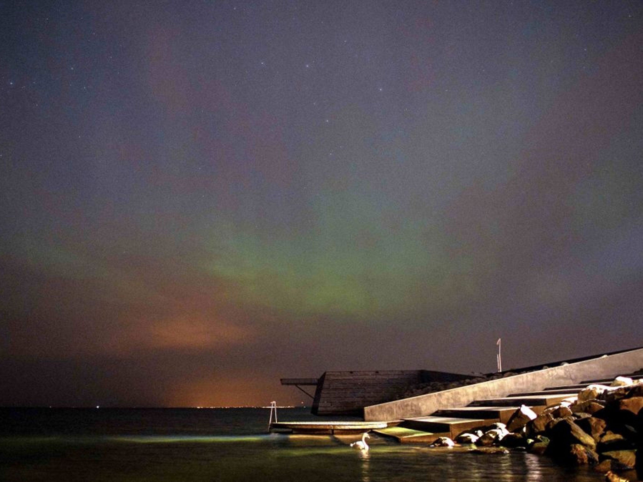 The Aurora Borealis over Oresund, the strait that separates Denmark and Sweden. (REUTERS/Johan Nilsson/TT News Agency