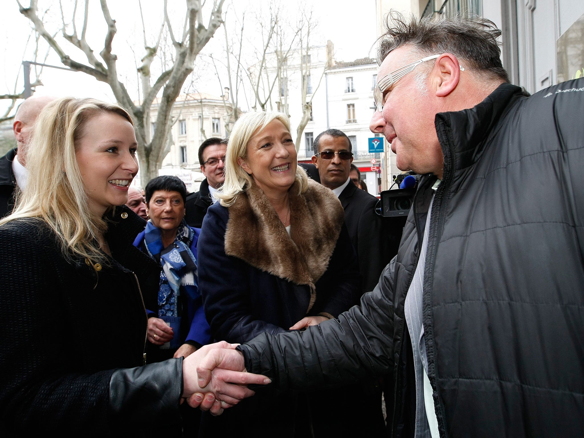 Marion (left) campaigning with her aunt, the Front National leader Marine Le Pen in Avignon