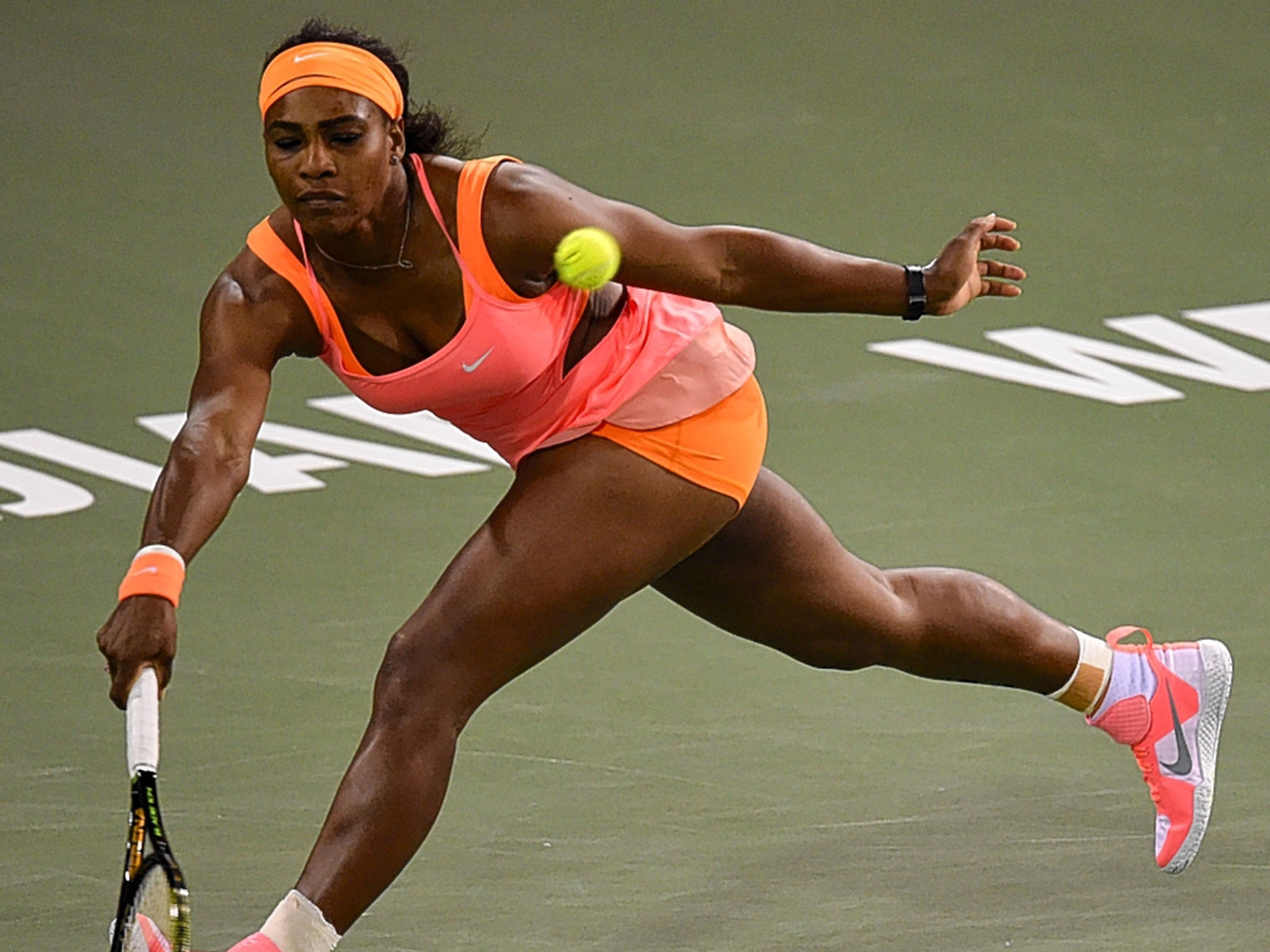 Serena Williams stretches to make a return during her win over Timea Bacsinszky