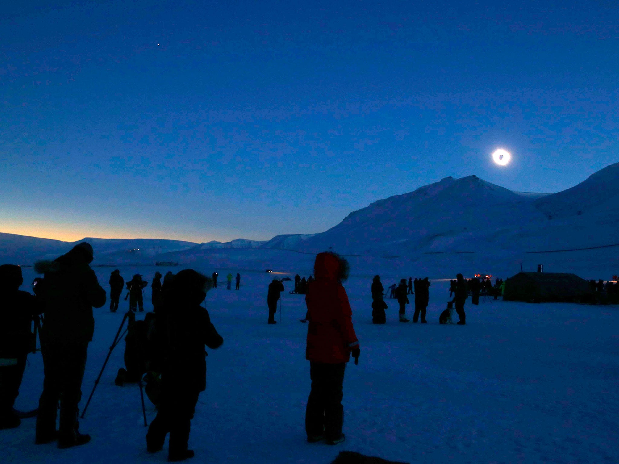 People view the total solar eclipse in Svalbard, Norway