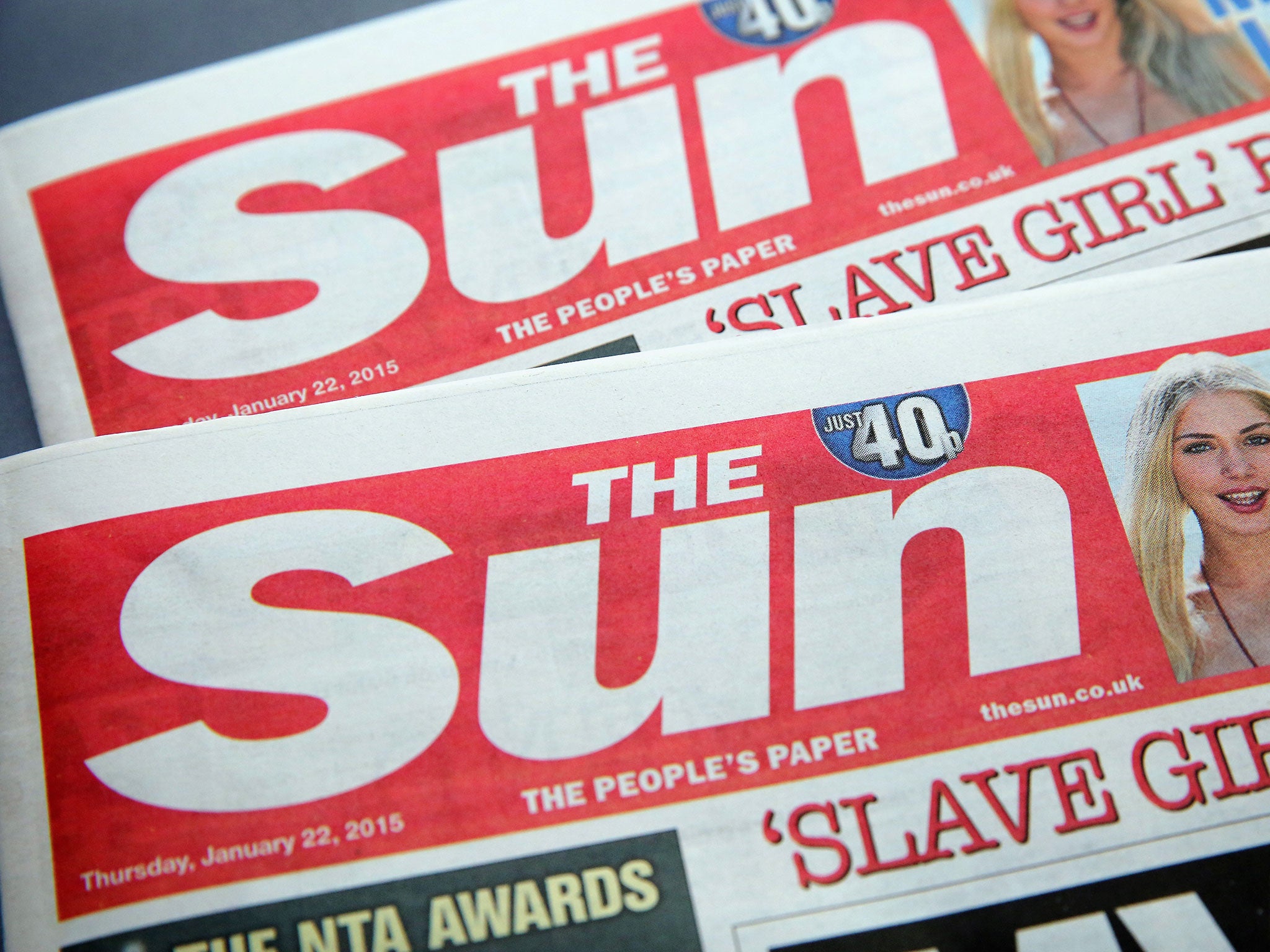 Several Sun journalists have been cleared of paying public officials.