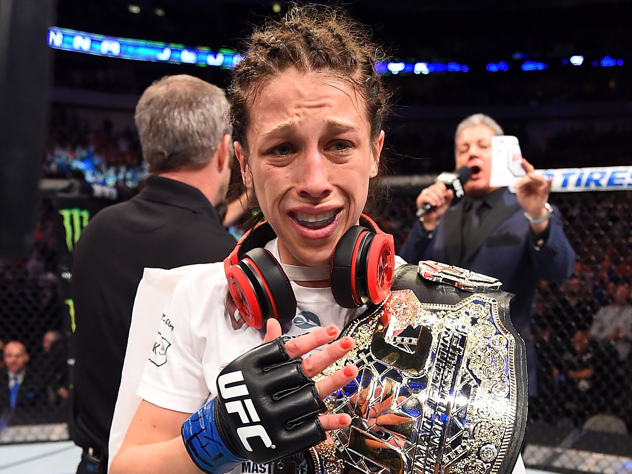 Joanna Jedrzejczyk celebrates after defeating Carla Esparza