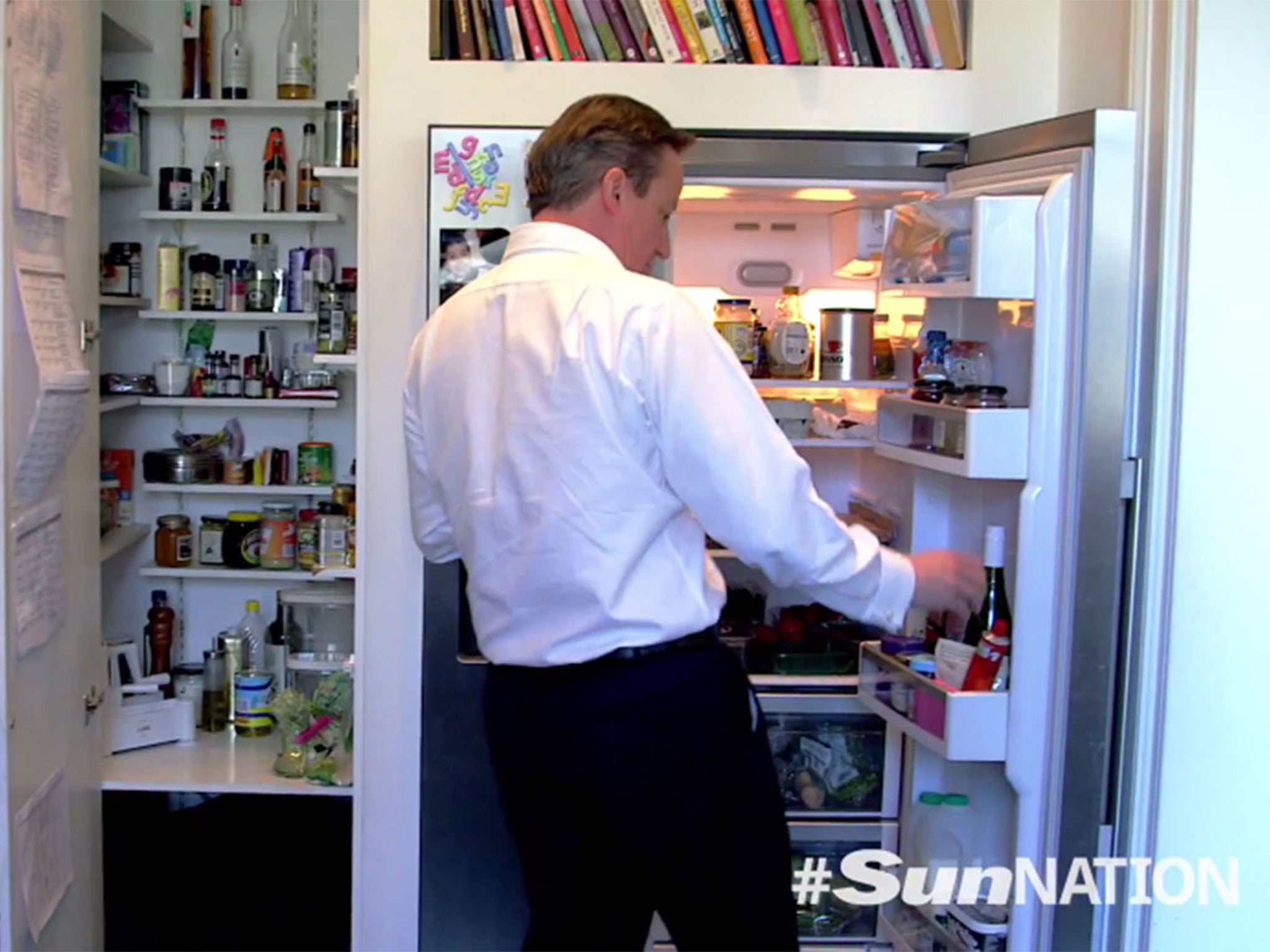 David Cameron fixes himself a quick bite for lunch in his spotless, bijou kitchen in Downing Street