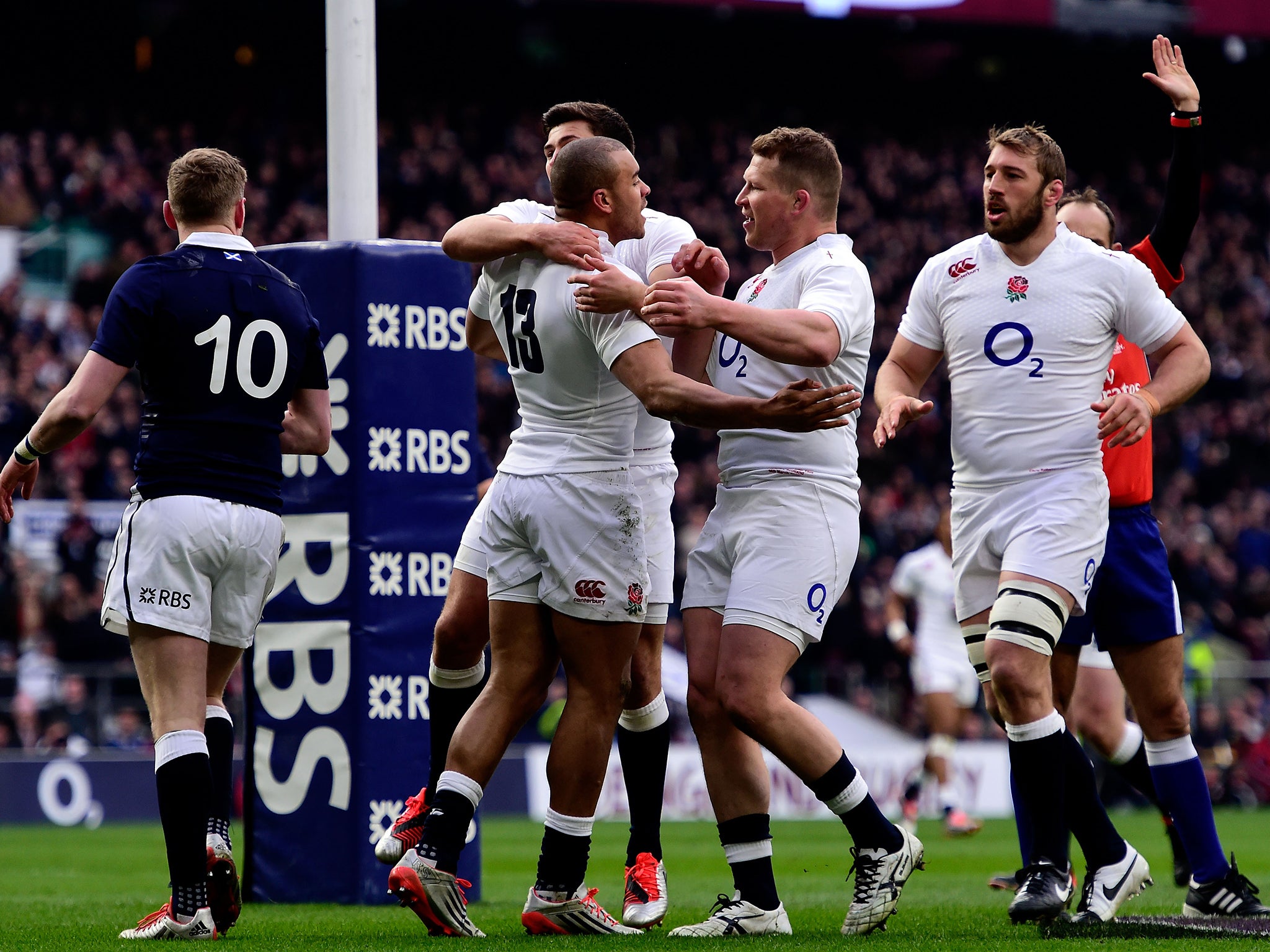 Jonathan Joseph celebrates his try against Scotland