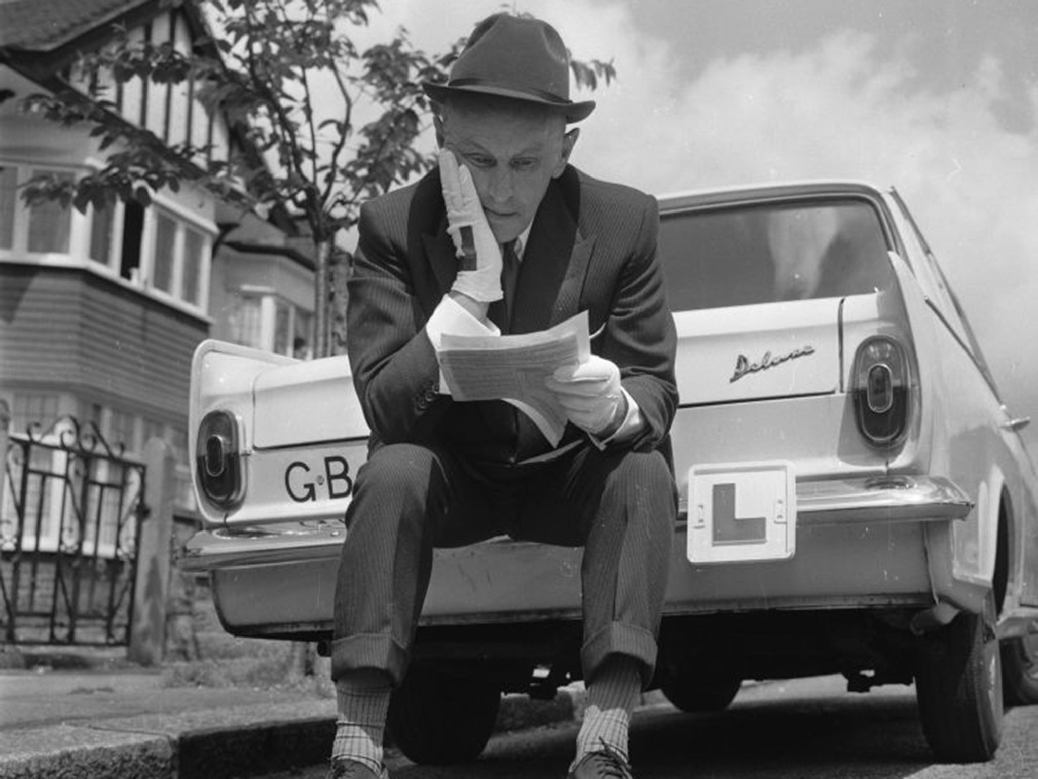 23rd May 1966: Arthur Ries, a learner driver, pictured having just failed his seventeenth driving test