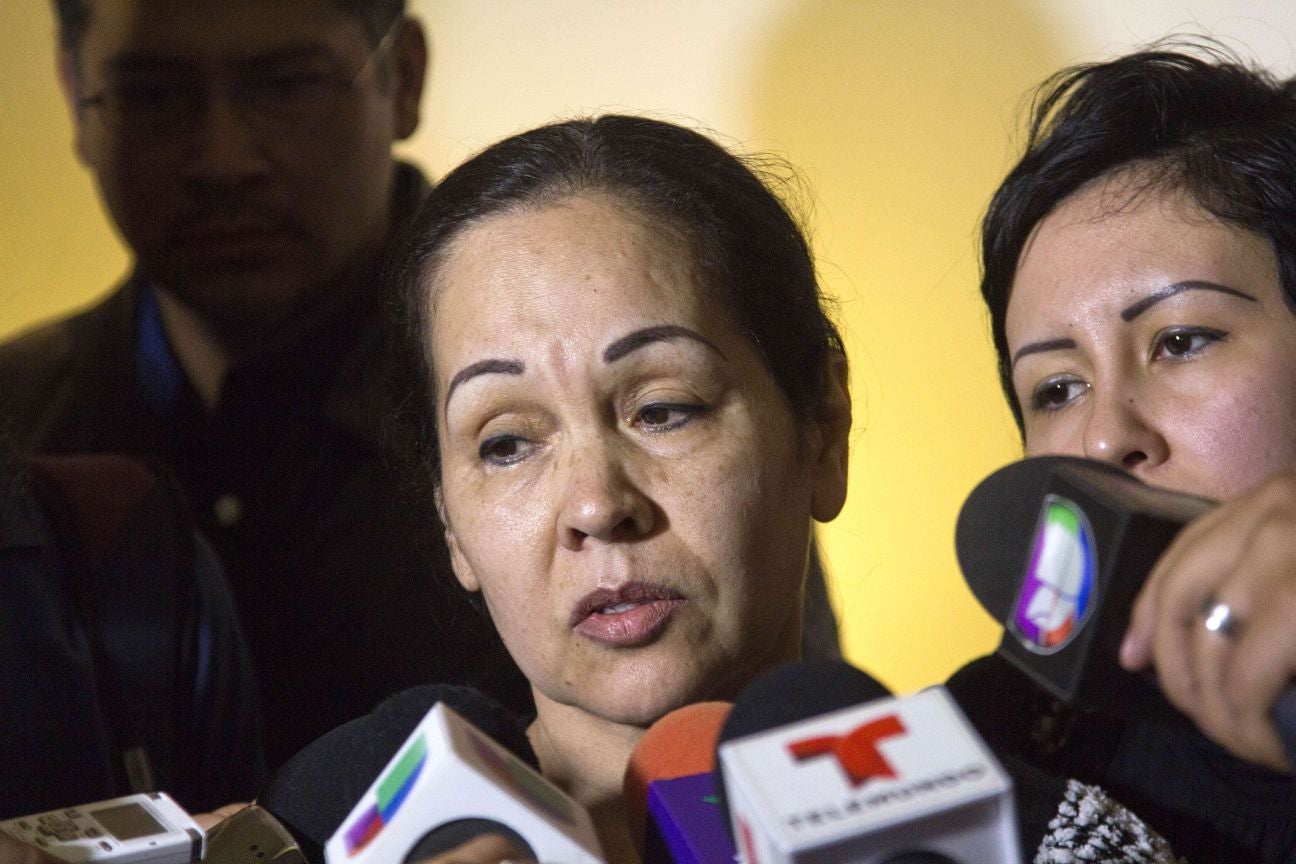 Aguayo's mother speaking to the press at the funeral (AFP/Getty)