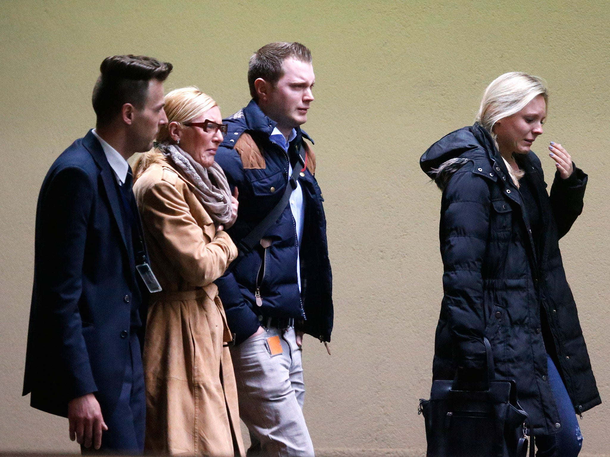 Relatives of passengers killed in Germanwings plane crash arrive at the airport in Duesseldorf, Germany