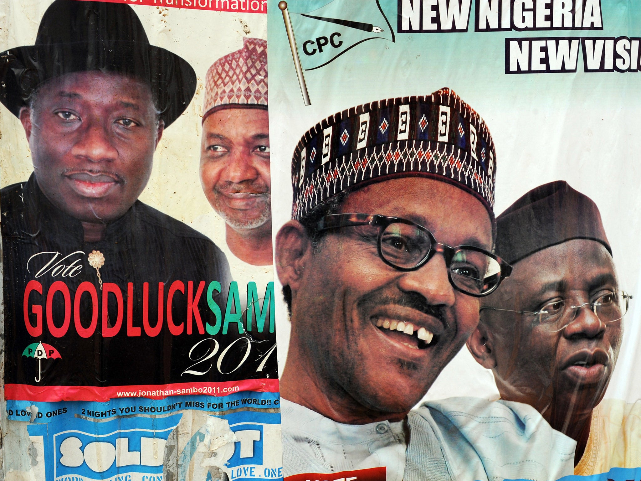 Posters representing the candidates in 2011, when General Buhari failed on his second bid to become a democratically elected president - Saturday's election will be his third