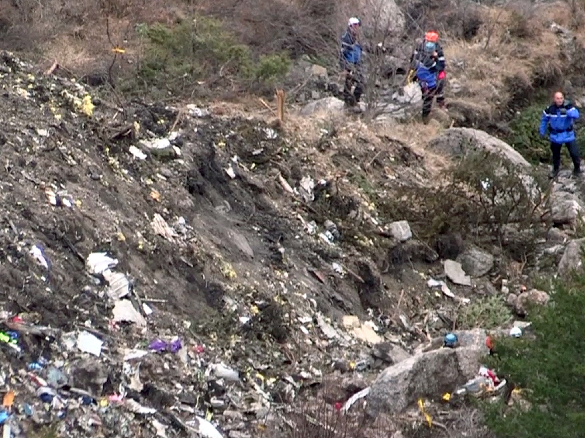 Search and rescue personnel at the crash site of the Germanwings Airbus A320 in the French Alps