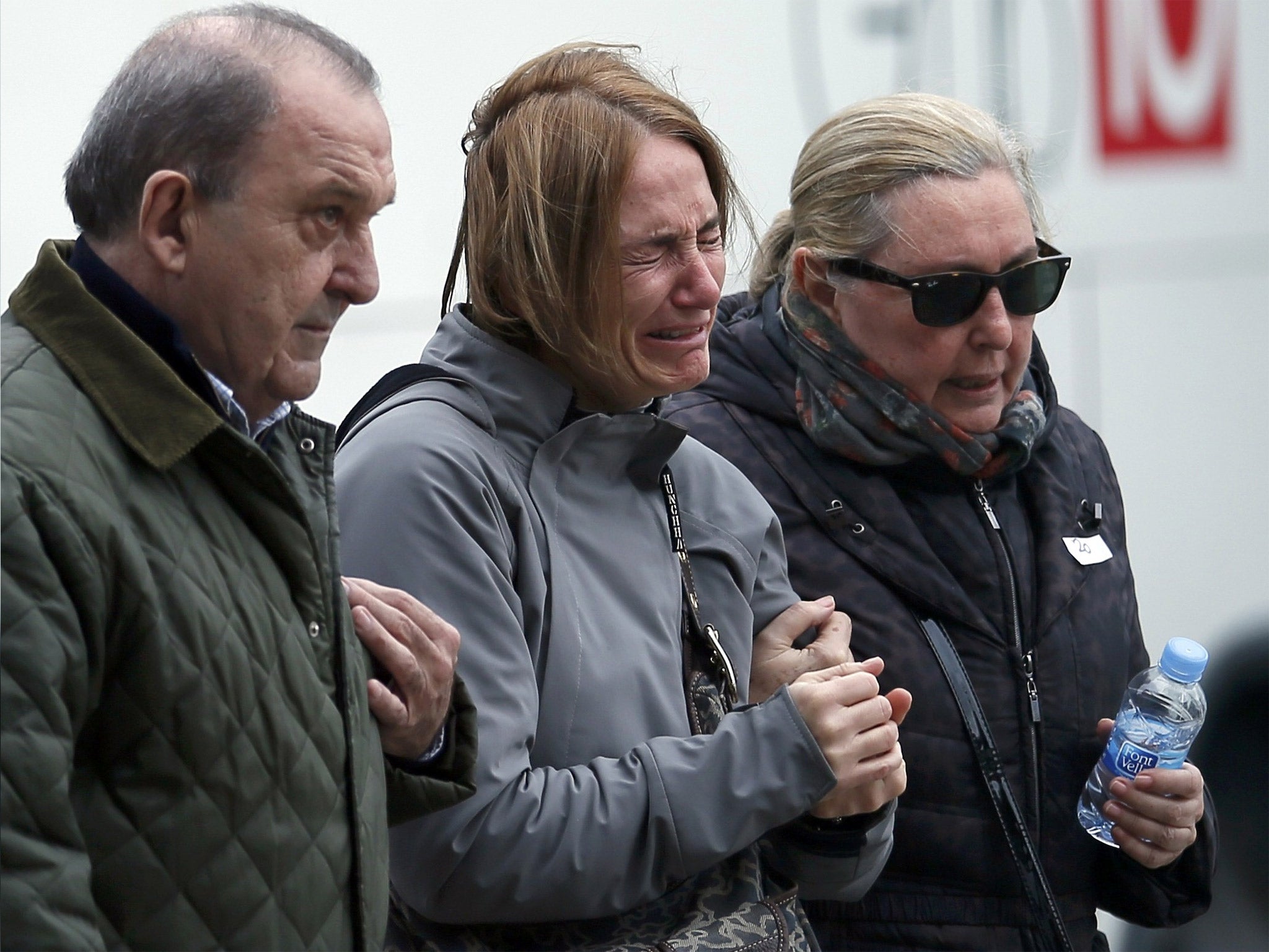 Relatives at Barcelona’s El Prat airport on Tuesday