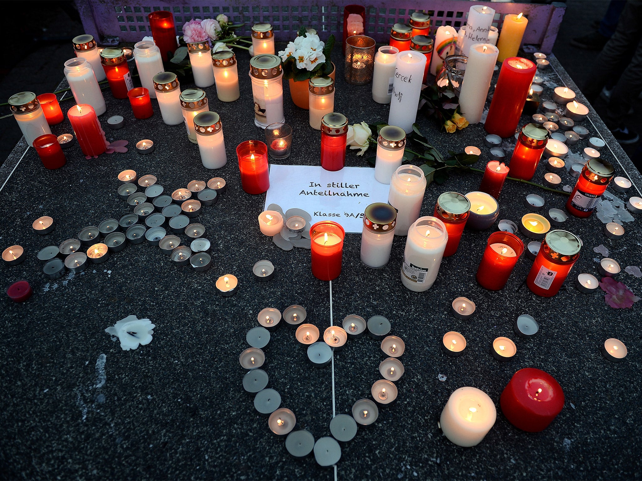 Candles lit for the victims, outside the Germanwings HQ in Cologne following the disaster (Getty)