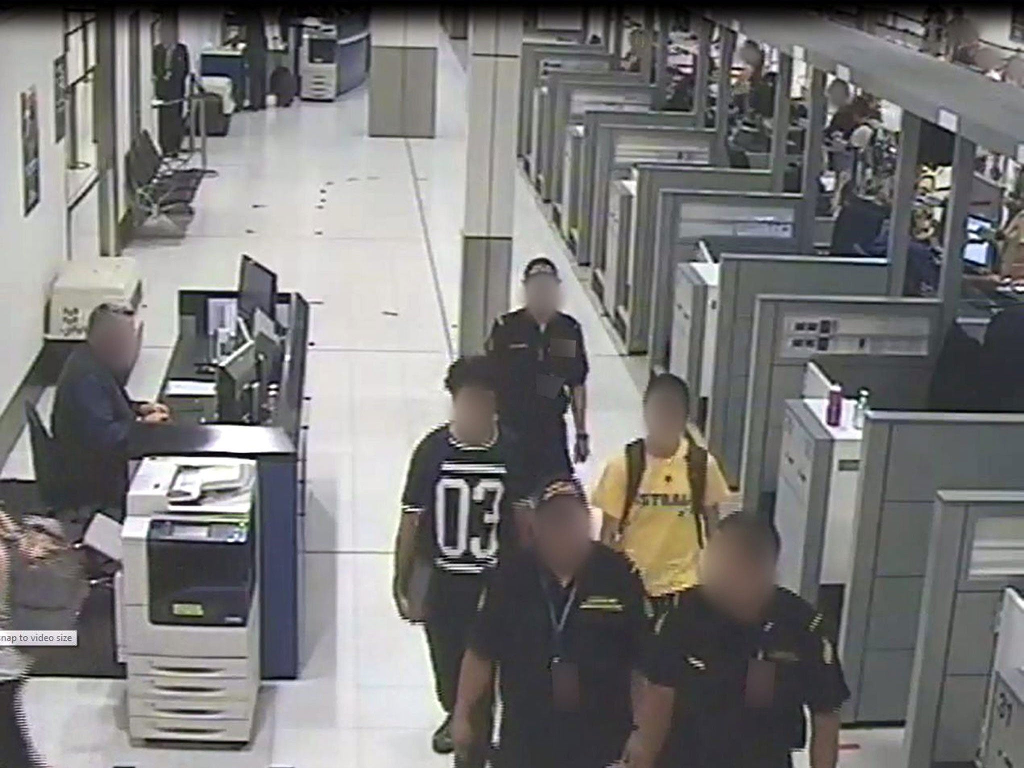 Handout image released by Sydney Airport on 08 March 2015 shows CCTV vision of two teenage brothers suspected of trying to fly to the Middle East to fight, at Sydney Airport, Australia, 06 March 2015