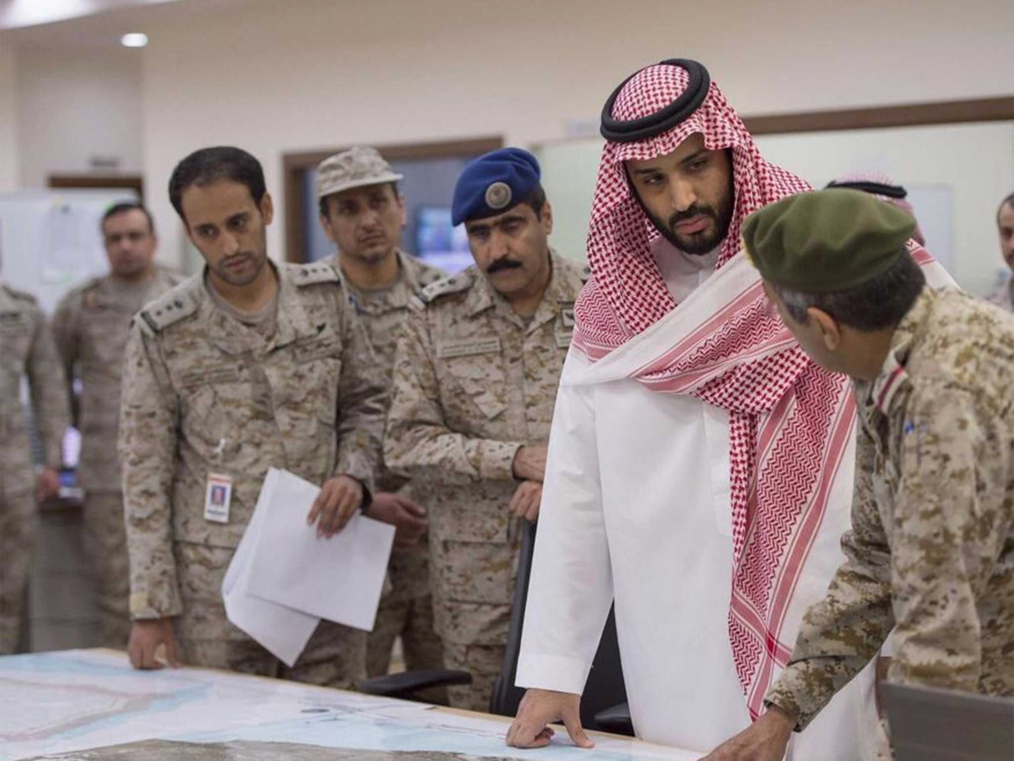 Saudi Defence Minister Mohammed bin Salman bin Abdul Aziz (2nd R) meeting with Saudi air forces officers