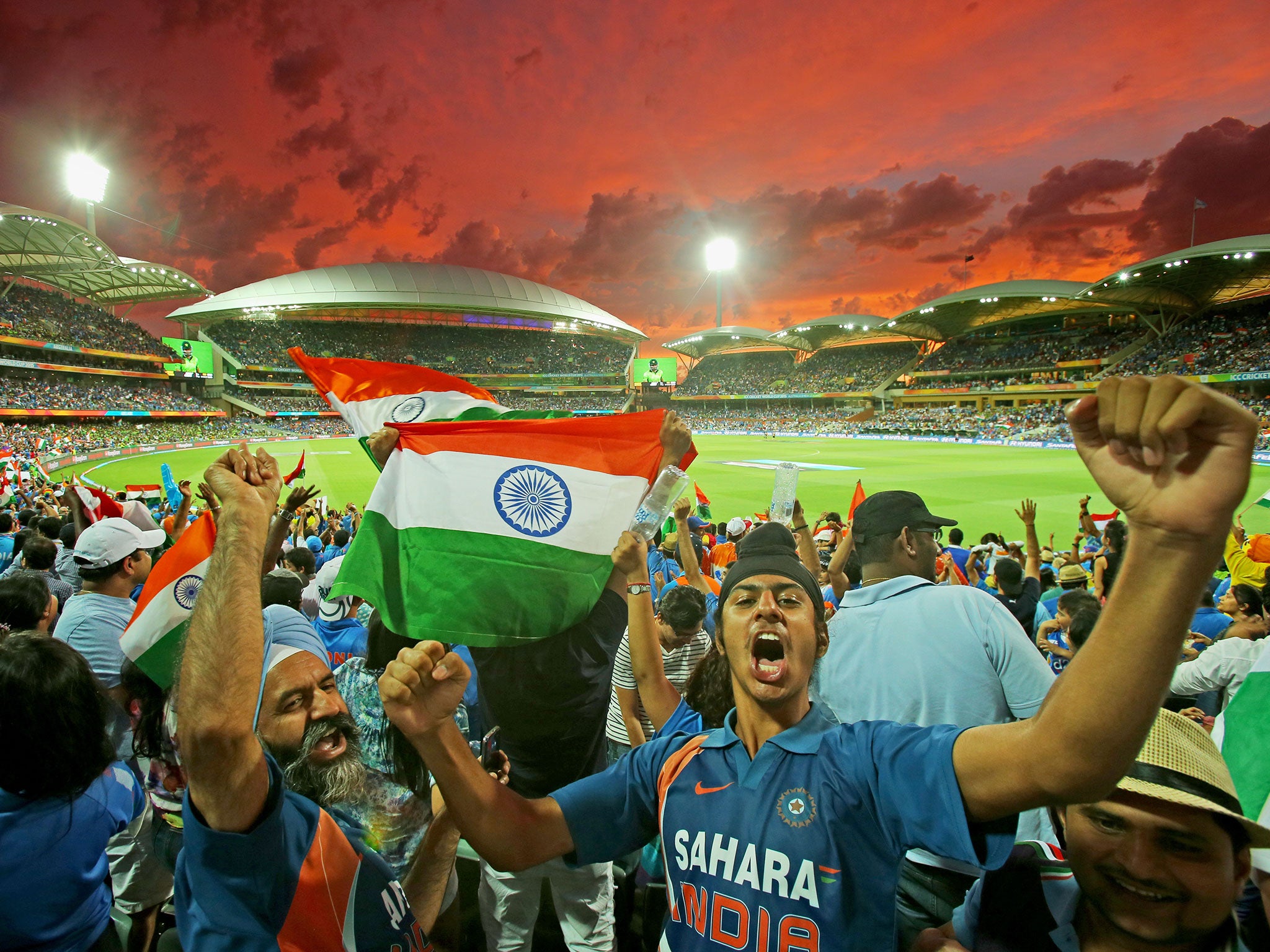 Indian fans cheer on the national side in the World Cup semi-final against Australia