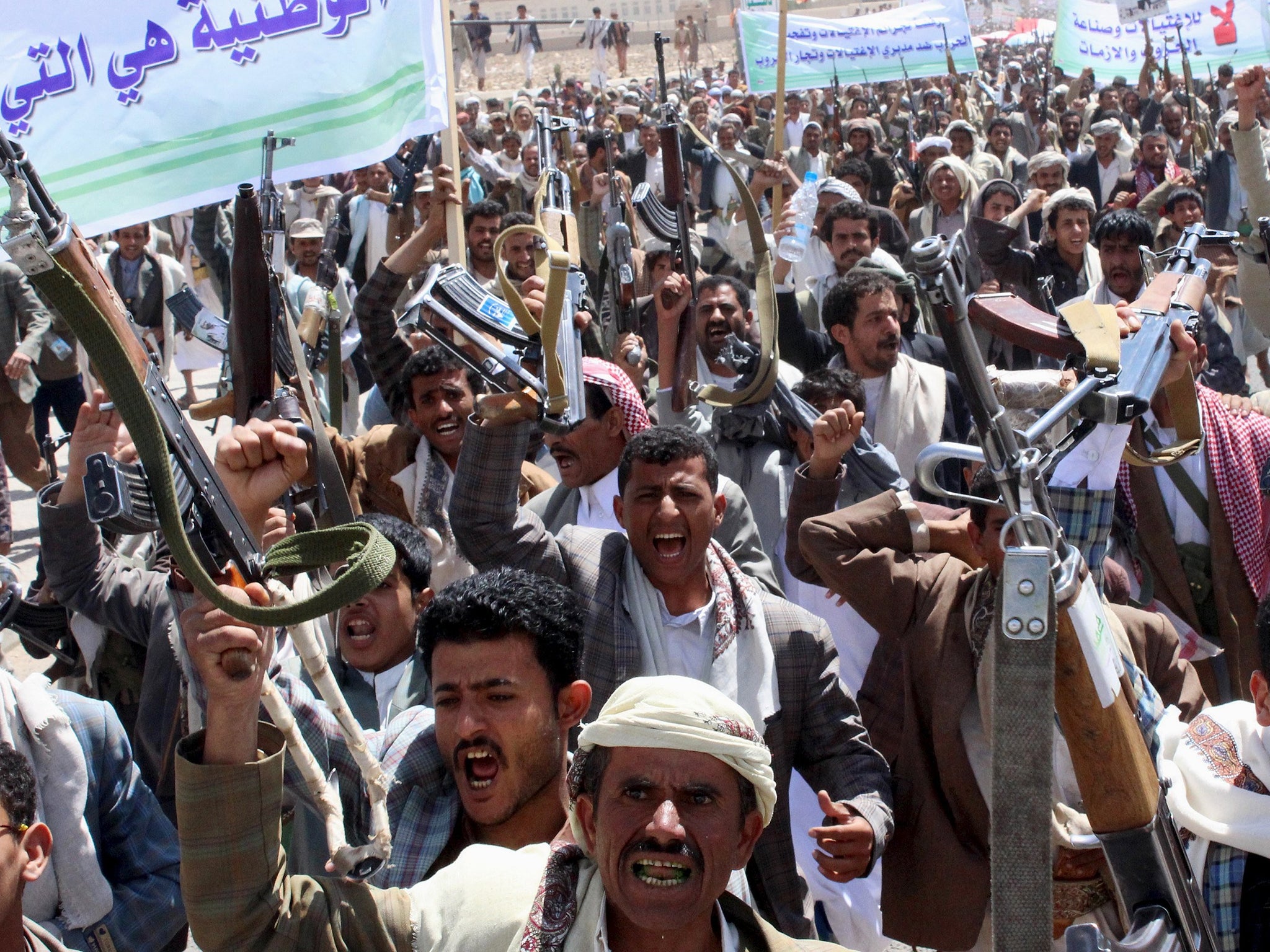 Followers of the Houthi movement demonstrate to show support to the movement