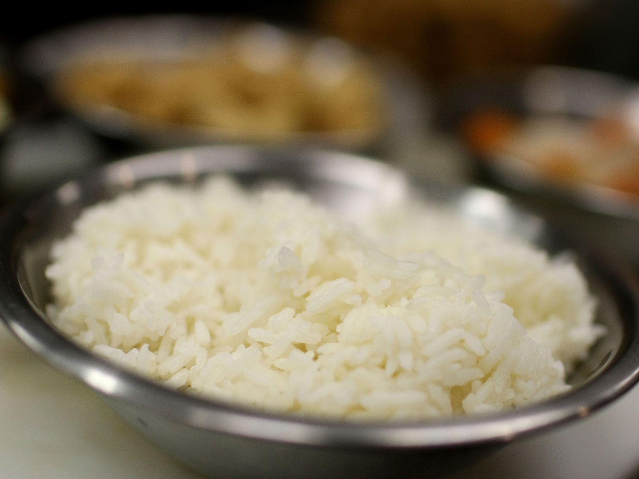 A bowl of jasmine rice sits on a counter in the kitchen at Osha Thai Restaurant May 5, 2008 in San Francisco, California. As rice prices continue to climb and some places are limiting the number of bags small businesses can purchase, many Bay Area restaur