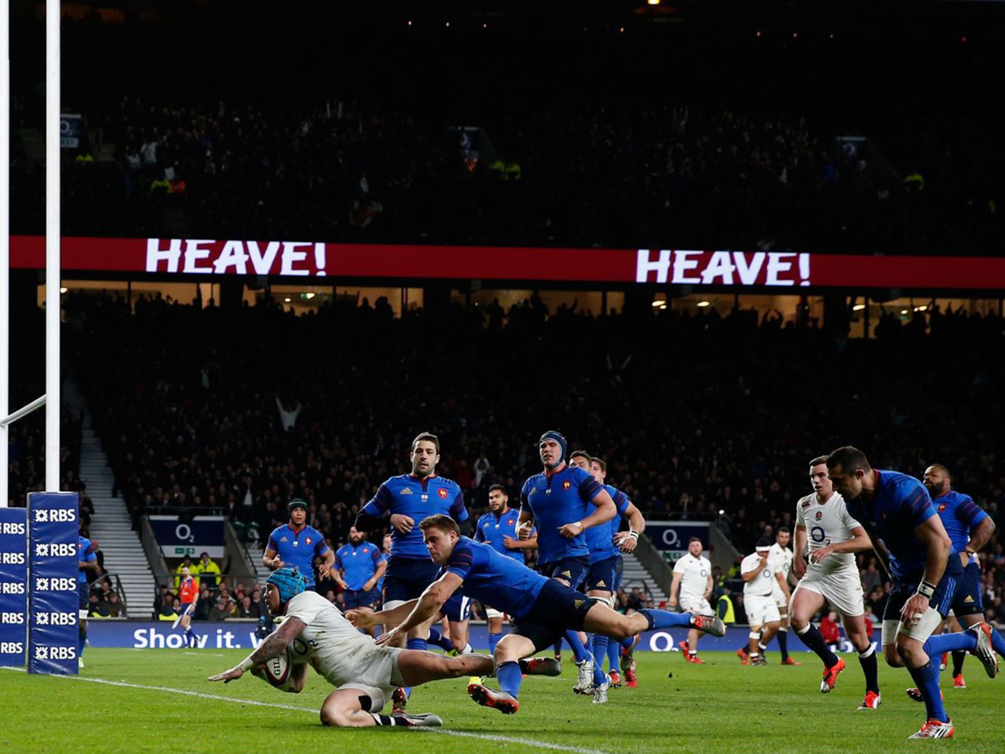 Wing Jack Nowell dives over for one of his two tries in England’s 55-35 victory over France