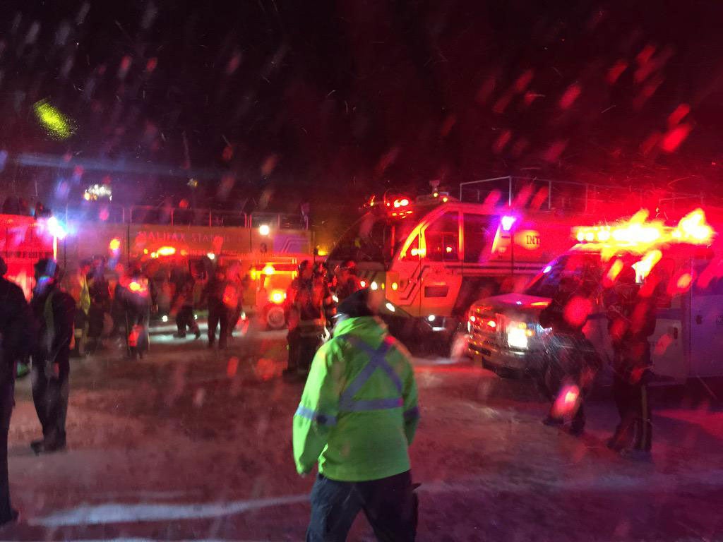 Fire engines attend the scene of the crash of an Air Canada plane at Halifax Airport