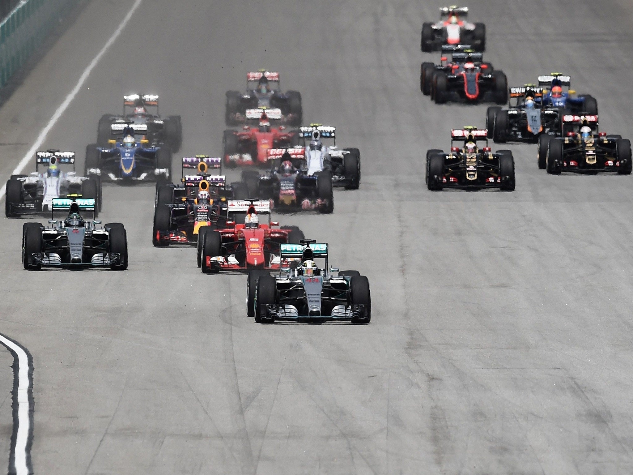 Hamilton leads from the start as Rosberg challenges Vettel