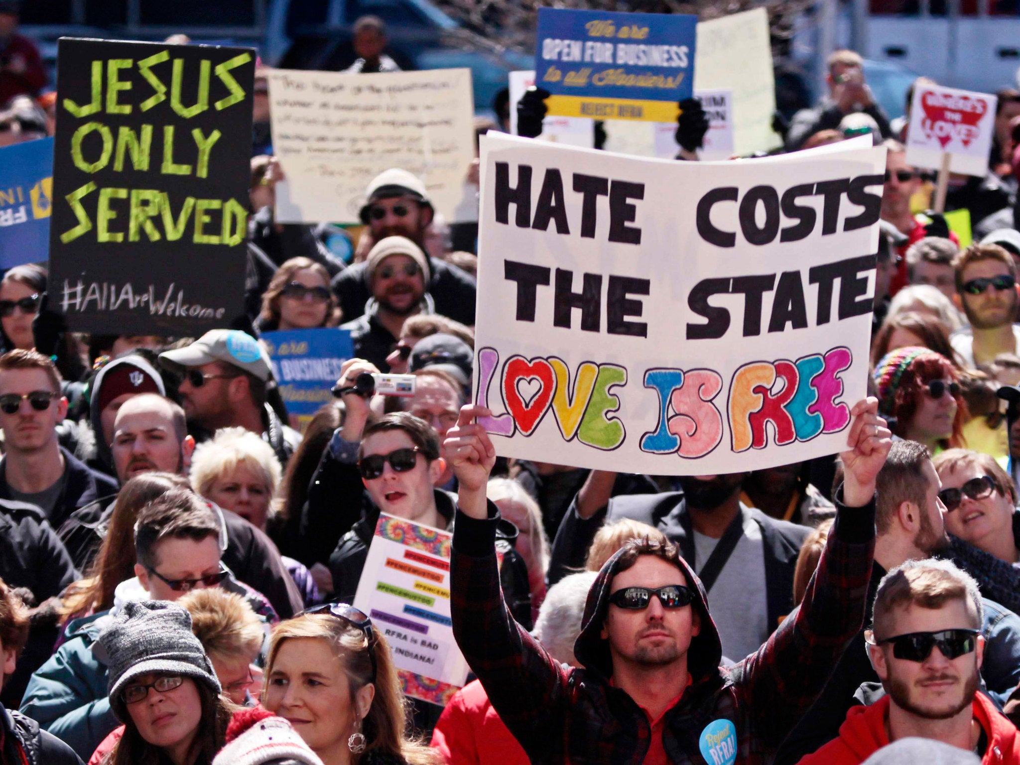 Demonstrators gather at Monument Circle to protest a controversial religious freedom bill recently signed by Governor Mike Pence, during a rally in Indianapolis