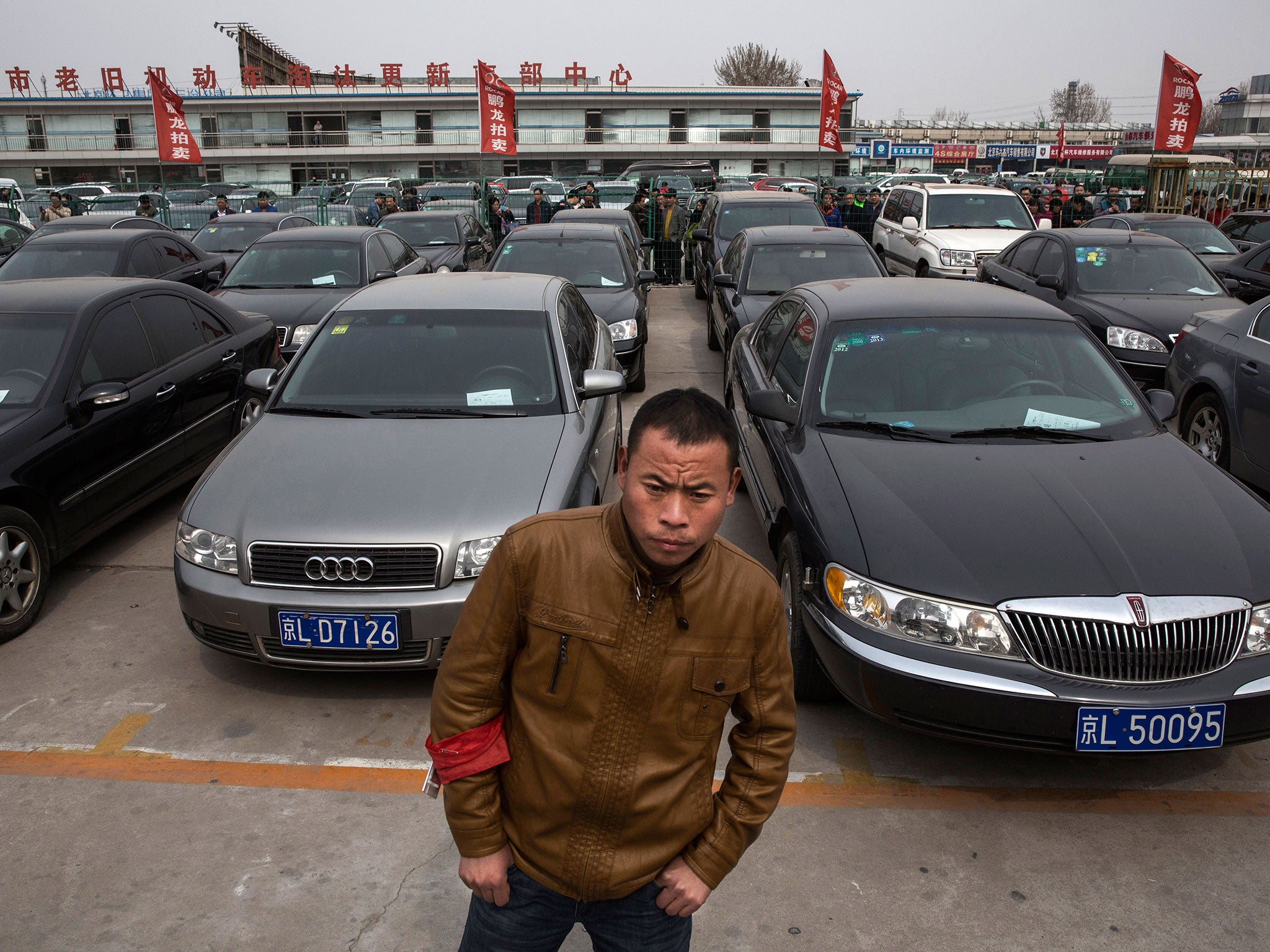 An auction in Beijing of luxury cars seized from government officials either for corruption or simply excess