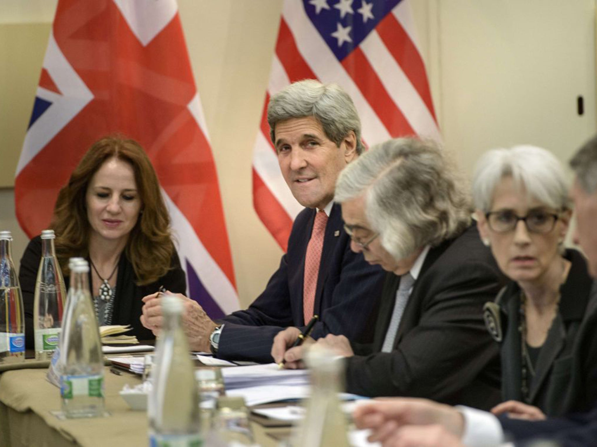 US Secretary of State John Kerry waits for the talks to begin at the Beau Rivage Palace Hotel in Lausanne yesterday. There is a deadline of midnight tonight for an agreement