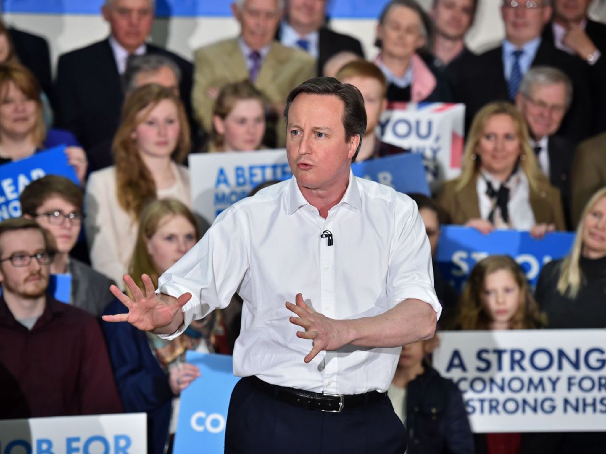 David Cameron spoke about his record in government and said the fight was between him and Ed Miliband in his first campaign speech at The Corsham School in Chippenham on Monday (AP)