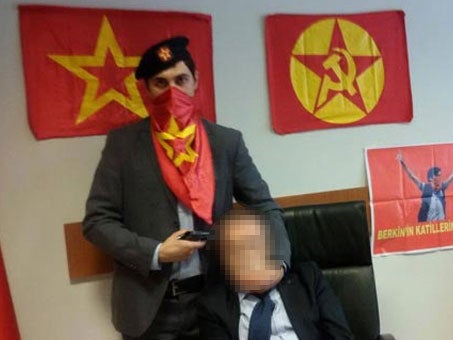 An image released by militants who took prosecutor Mehmet Selim Kiraz hostage at an Istanbul courthouse