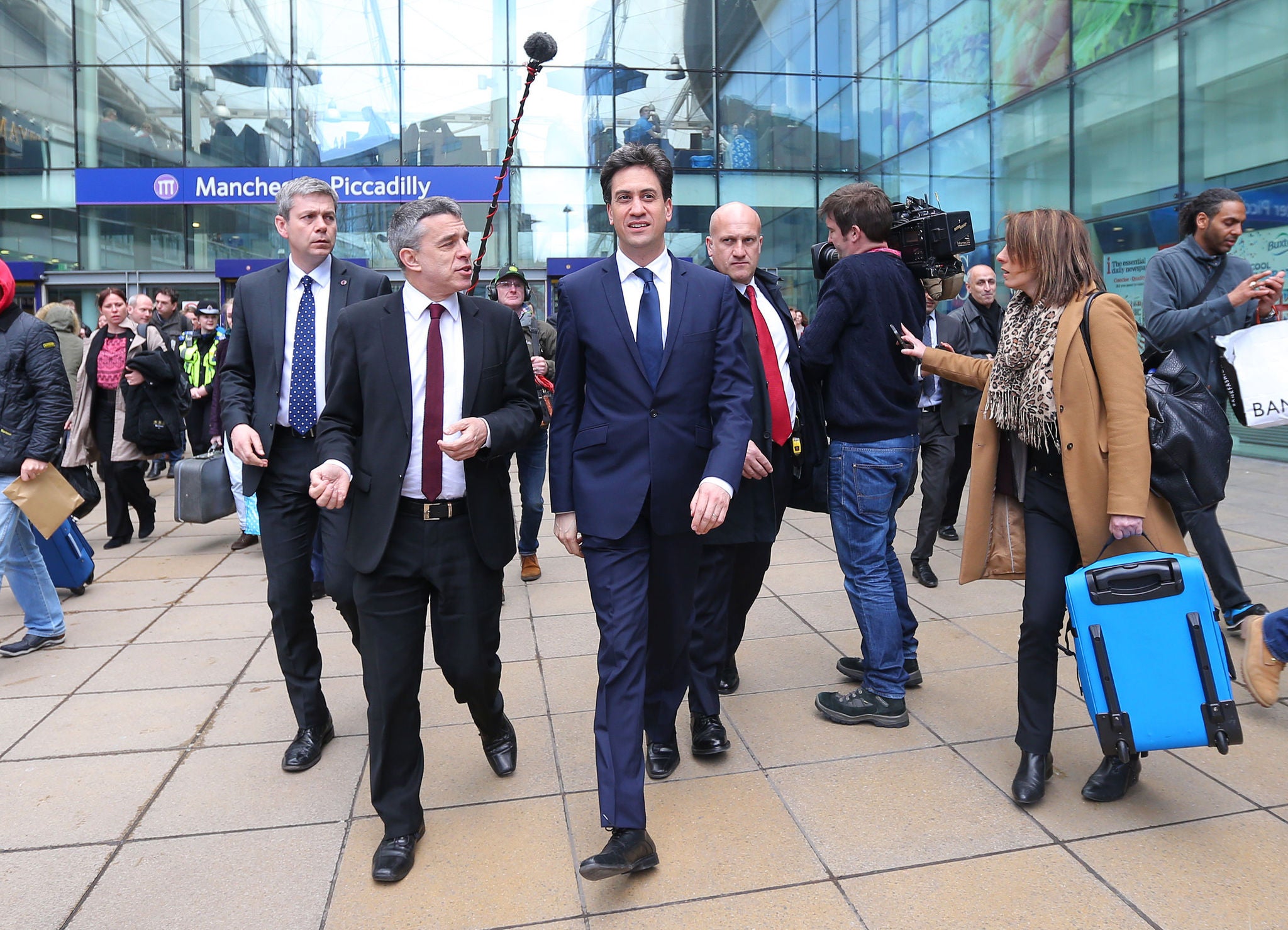 Ed Miliband on a visit to Manchester today (PA)