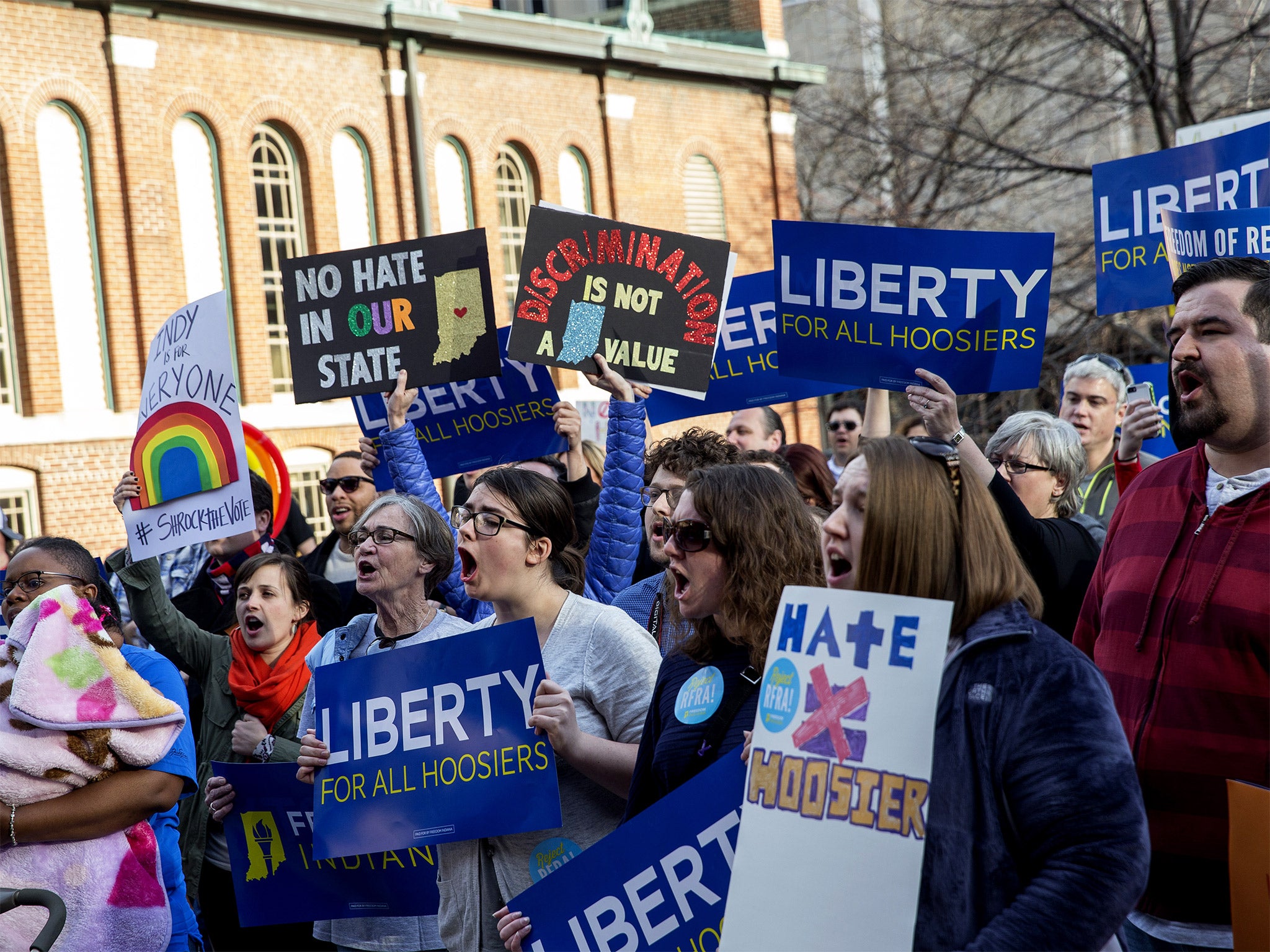 Demonstrators gather outside the City County Building in Indianapolis on Tuesday