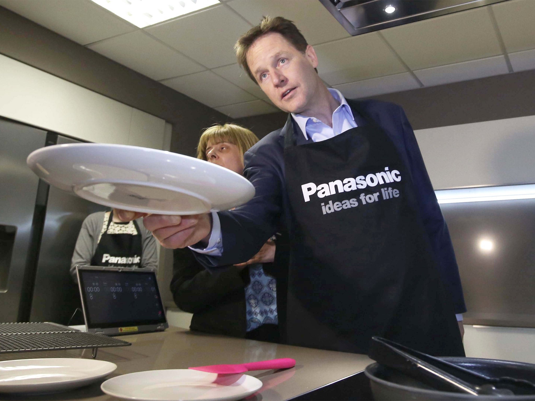 Dishing it out: Nick Clegg visits Panasonic in Cardiff yesterday