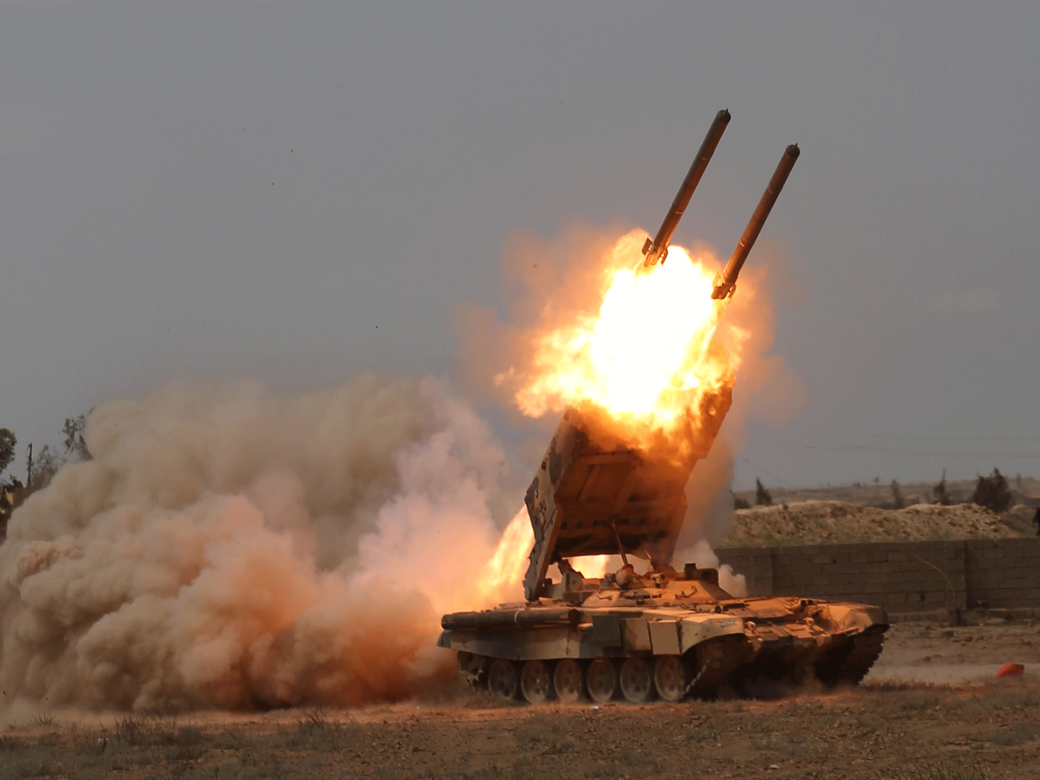 Iraqi security forces launch rockets against Isis positions in Tikrit