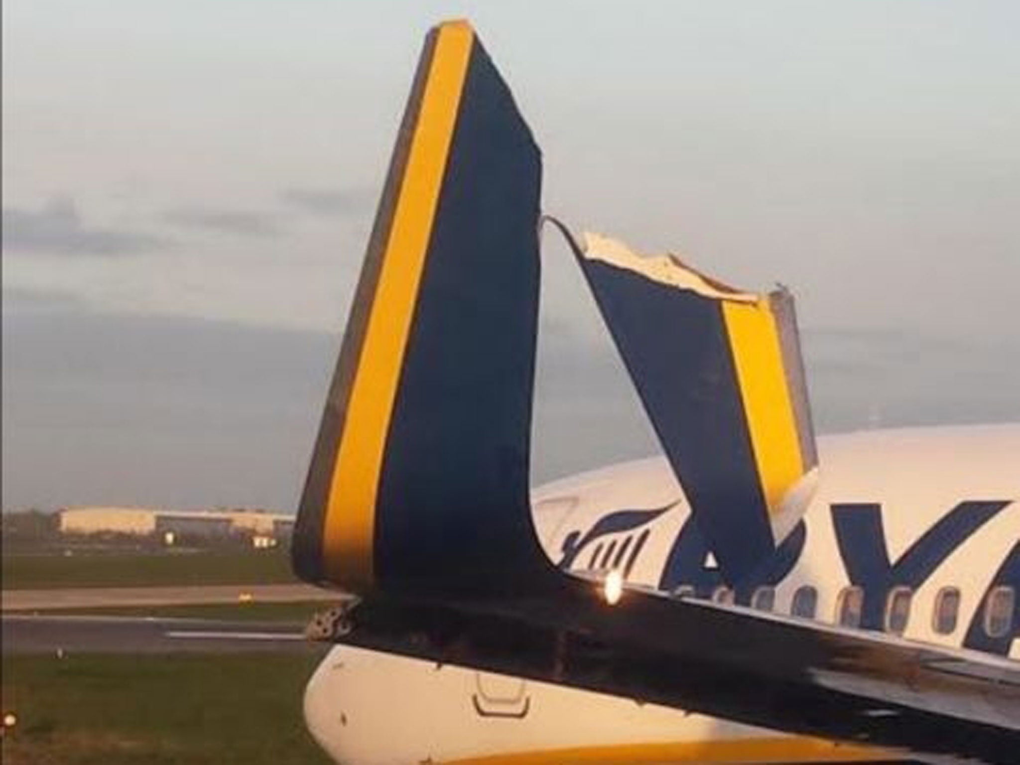 One of the Ryanair planes at Dublin Airport with a damaged wing after hitting another Ryanair plane.