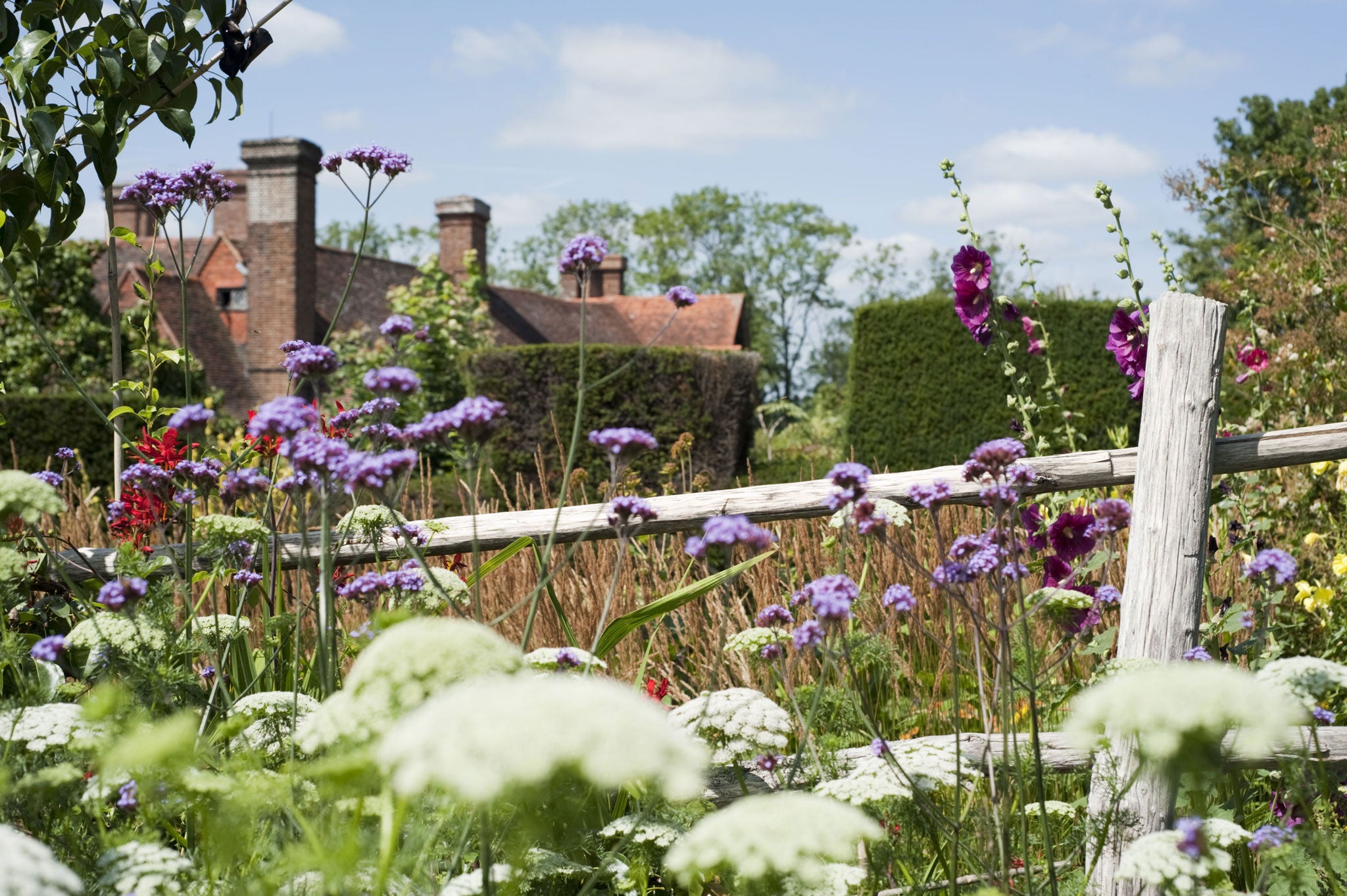 Great Dixter's owners decided to bring the wild grasslands and meadows from the surrounding countryside back into the garden (Rex)