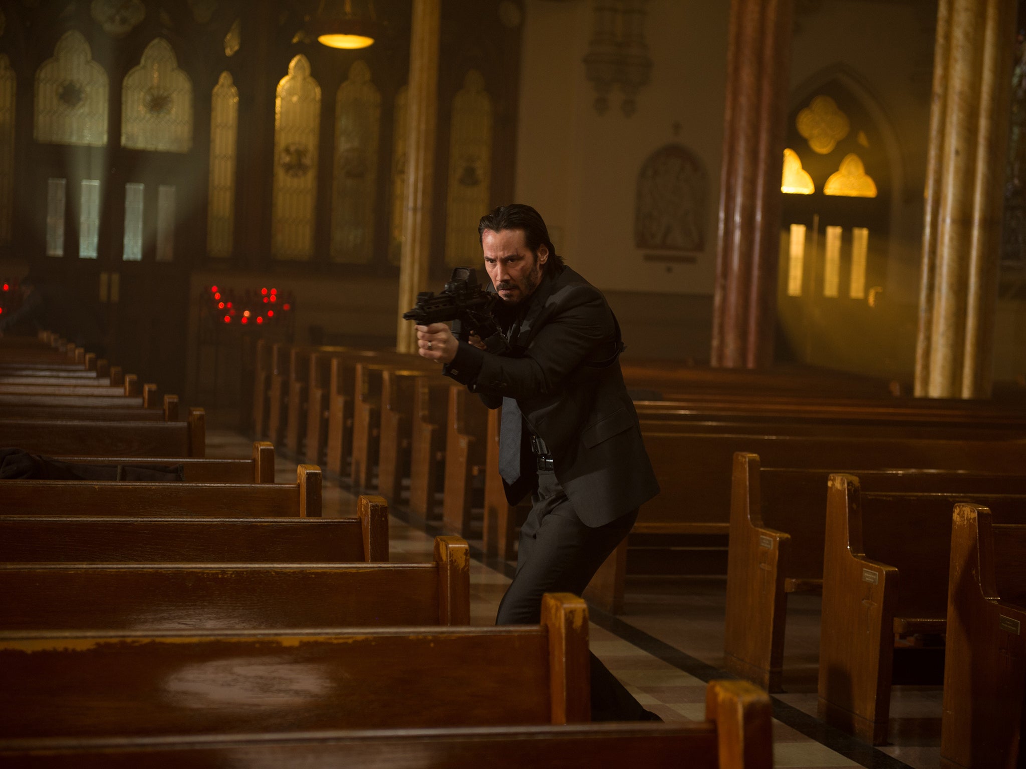 Black day: Keanu Reeves as hitman John Wick in his new film