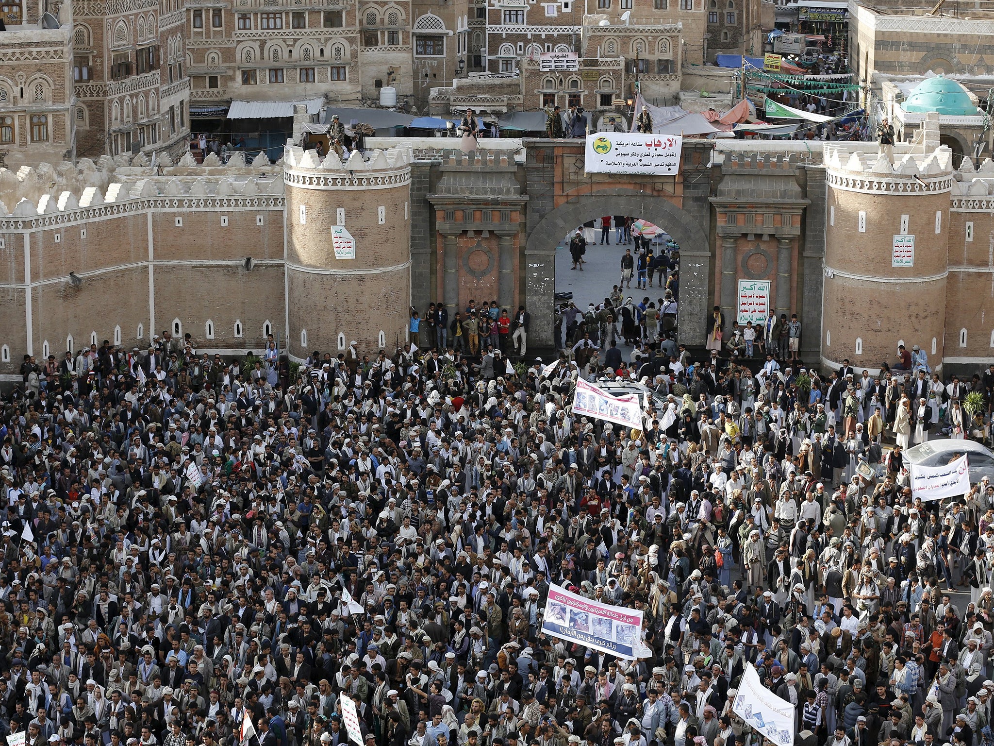 Followers of the Houthi group demonstrate against the Saudi-led air strikes on Yemen, in Sanaa