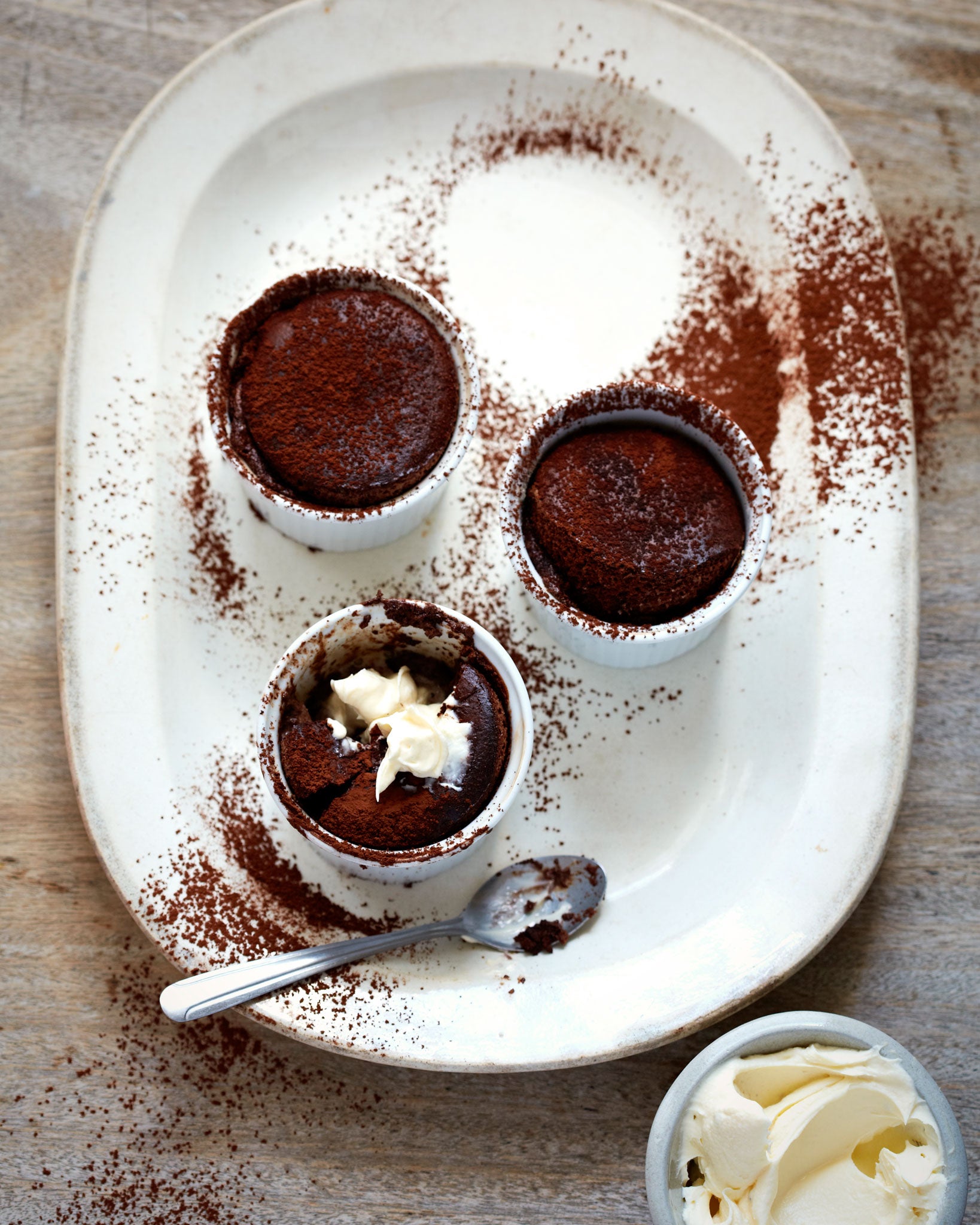 Chocolate soufflé with maple syrup and cardamom cream