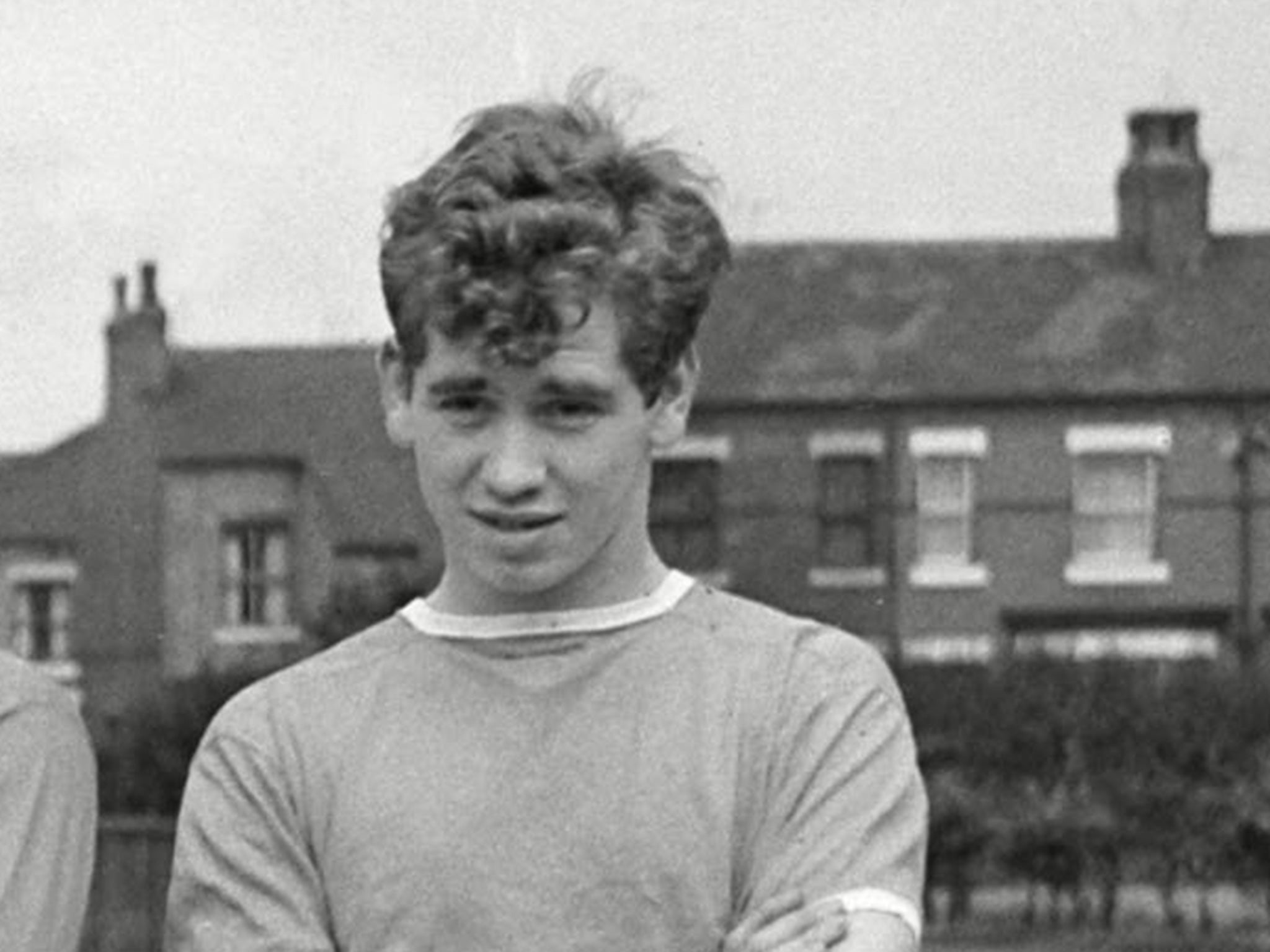 Moir takes his place in the Man Utd team picture at the start of the 1961-62 season