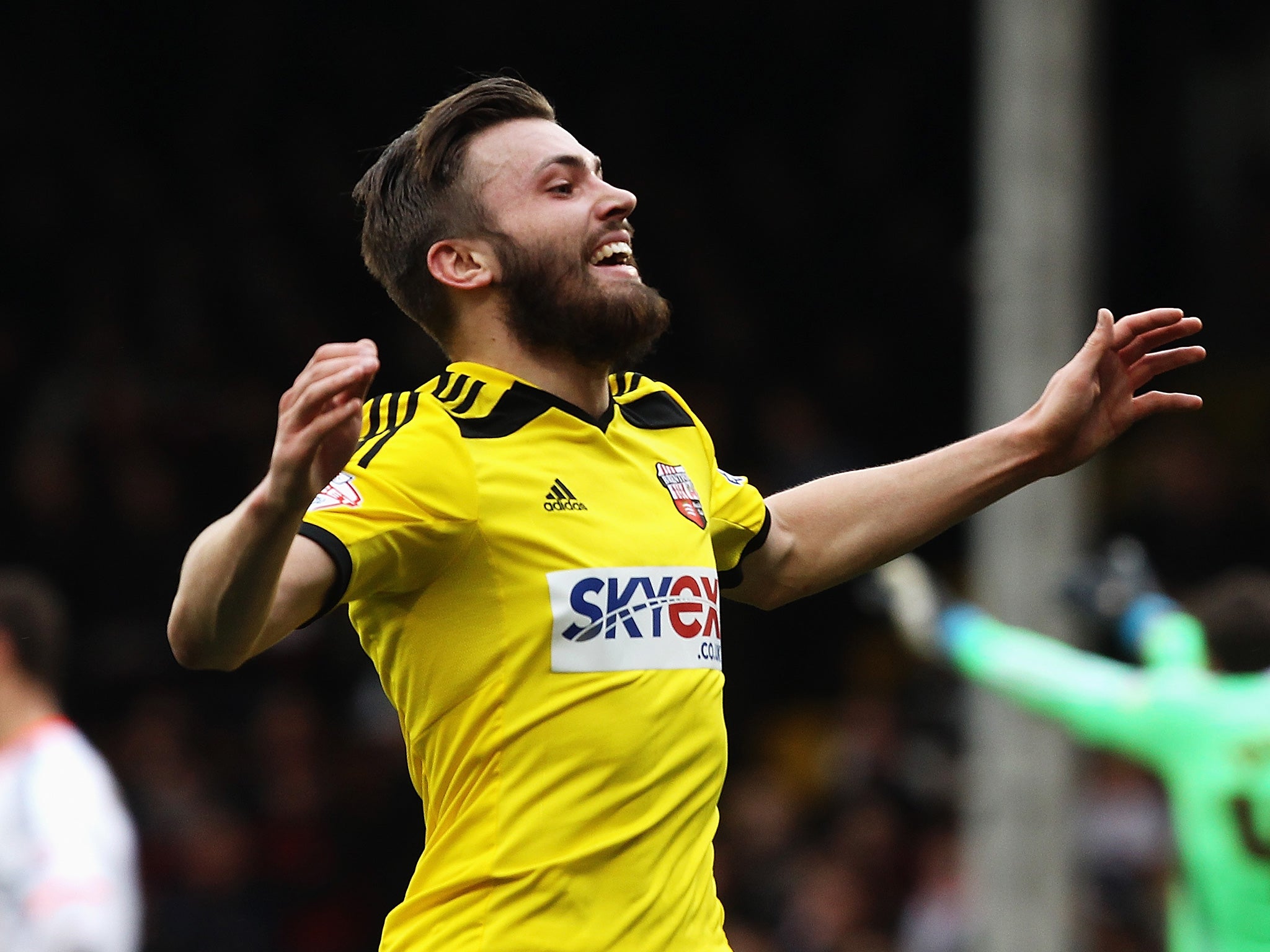 Stuart Dallas celebrates scoring against Fulham