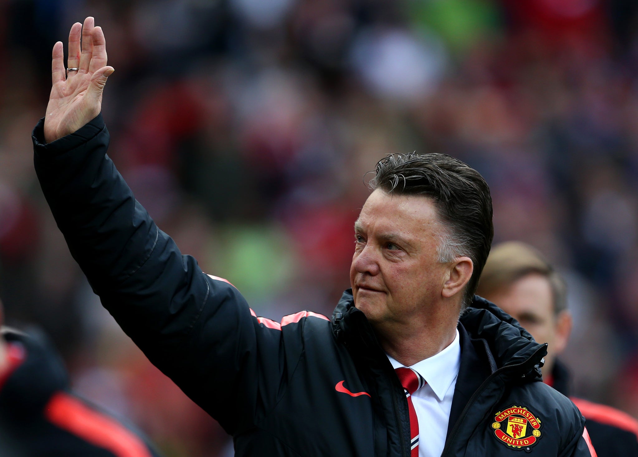 Louis van Gaal greets the Old Trafford fans