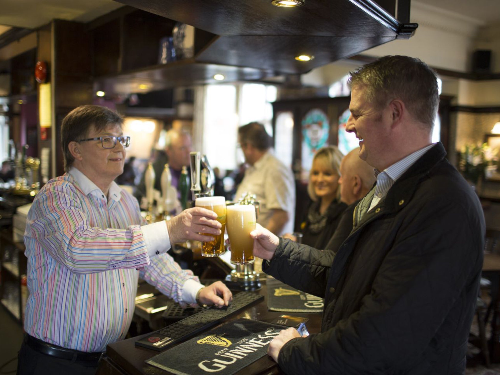 Tory Stuart Andrew, right, with pub landlord and constituent Joe Moran